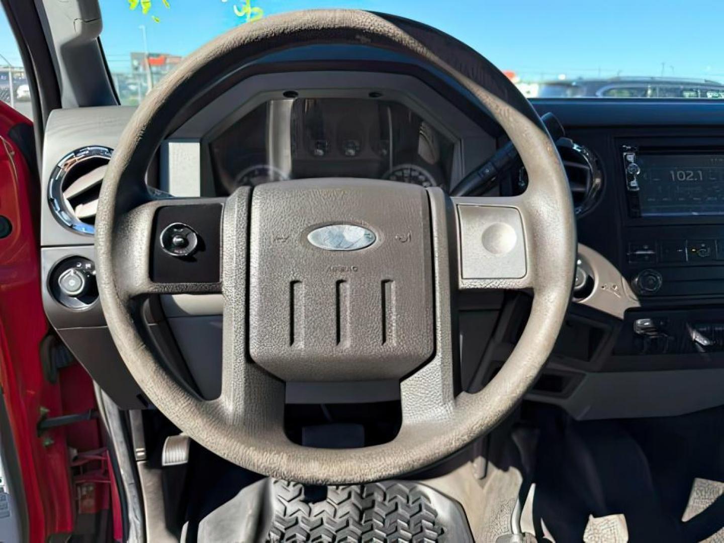 2013 Vermillion Red /Steel Cloth Interior Ford F-350 SD (1FT8W3B60DE) with an 62L V8 OHV 16V engine, Automatic transmission, located at 1175 N Woodruff Ave, Idaho Falls, ID, 83401, 43.506901, -111.999657 - At Timberline Auto, finding a great deal on your next vehicle is always easy! Our experienced sales staff's goal is to help find you the right vehicle at the right price! Our knowledgeable finance department has options for almost any credit score. We offer extended service contract options to prote - Photo#12