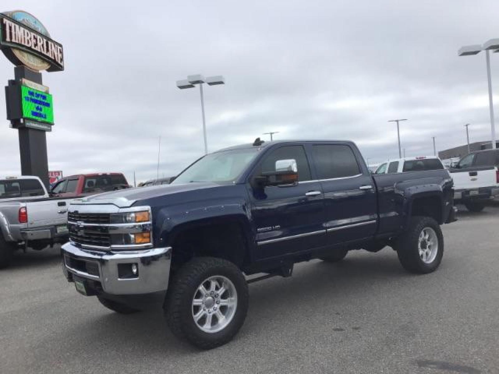 2016 Deep Ocean Blue Metallic /Cocoa/Dune, leather Chevrolet Silverado 3500HD LTZ Crew Cab 4WD (1GC4K0C86GF) with an 6.6L V8 OHV 32V TURBO DIESEL engine, 6-Speed Automatic transmission, located at 1235 N Woodruff Ave., Idaho Falls, 83401, (208) 523-1053, 43.507172, -112.000488 - Photo #0