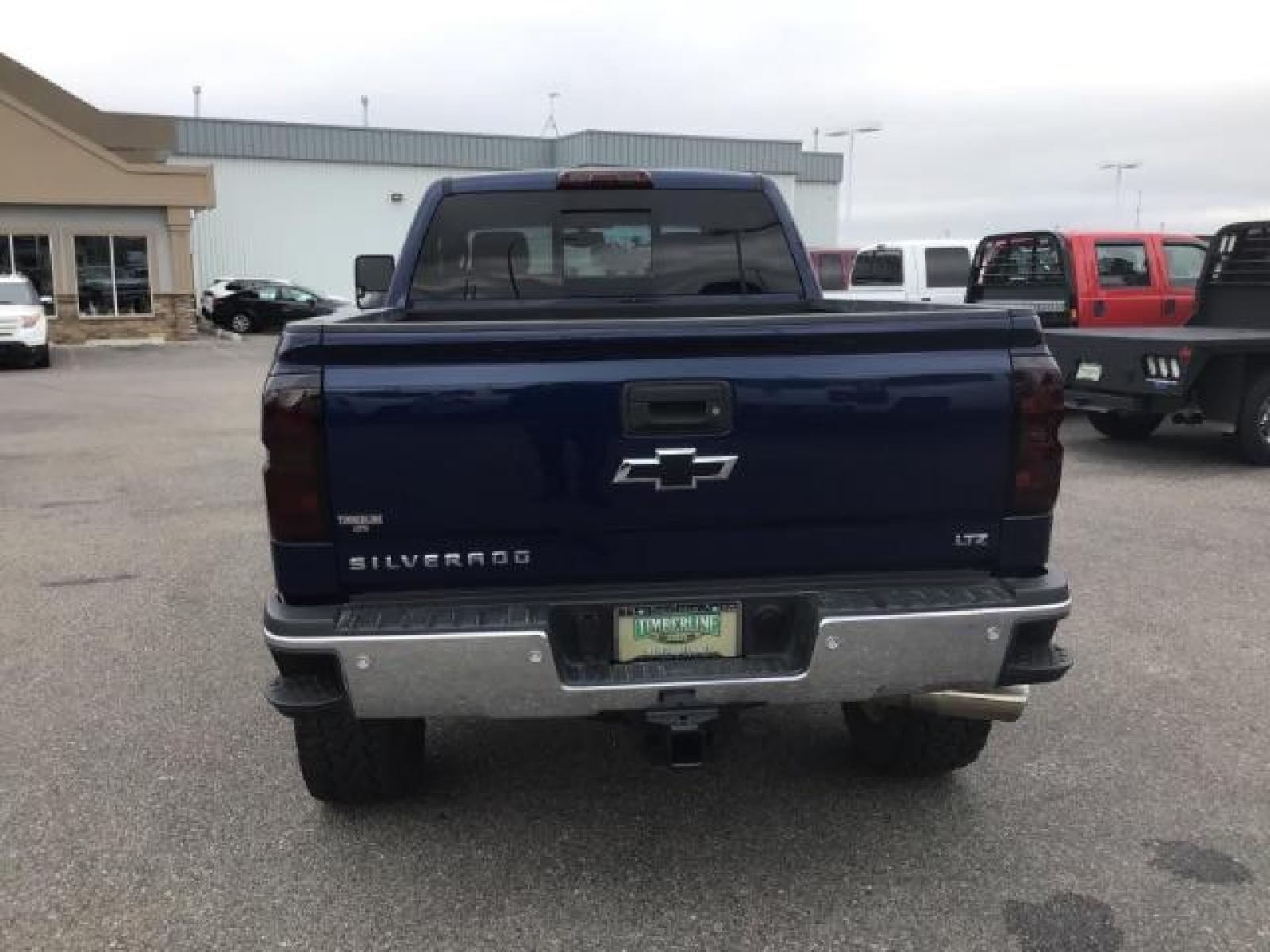 2016 Deep Ocean Blue Metallic /Cocoa/Dune, leather Chevrolet Silverado 3500HD LTZ Crew Cab 4WD (1GC4K0C86GF) with an 6.6L V8 OHV 32V TURBO DIESEL engine, 6-Speed Automatic transmission, located at 1235 N Woodruff Ave., Idaho Falls, 83401, (208) 523-1053, 43.507172, -112.000488 - Photo #3