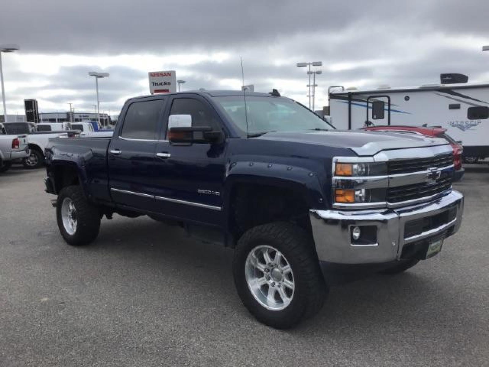 2016 Deep Ocean Blue Metallic /Cocoa/Dune, leather Chevrolet Silverado 3500HD LTZ Crew Cab 4WD (1GC4K0C86GF) with an 6.6L V8 OHV 32V TURBO DIESEL engine, 6-Speed Automatic transmission, located at 1235 N Woodruff Ave., Idaho Falls, 83401, (208) 523-1053, 43.507172, -112.000488 - Photo #6