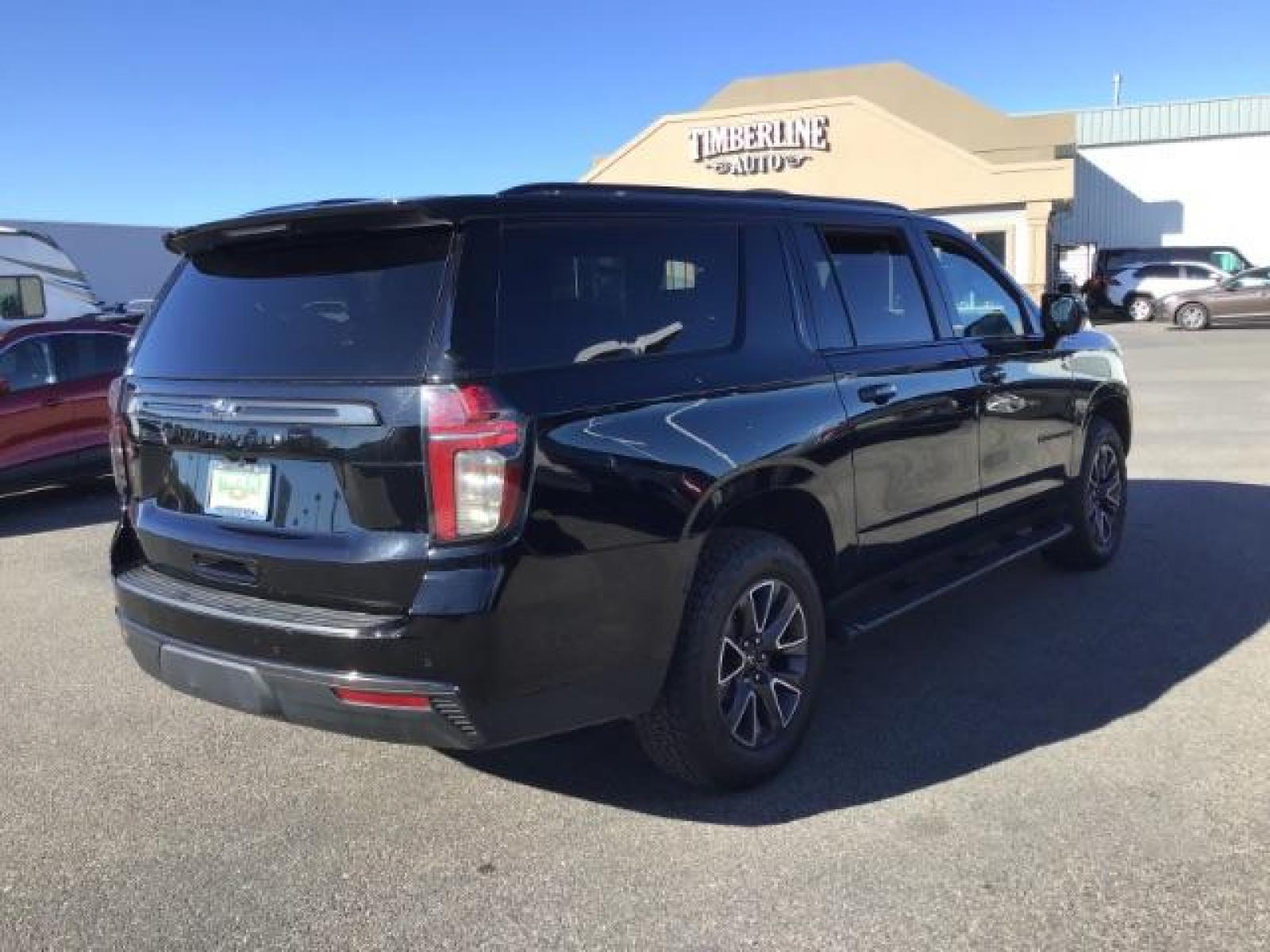 2022 Black /Jet Black Chevrolet Suburban Z71 (1GNSKDKDXNR) with an 5.3L V8 OHV 16V engine, 10-Speed Automatic transmission, located at 1235 N Woodruff Ave., Idaho Falls, 83401, (208) 523-1053, 43.507172, -112.000488 - This 2022 Chevrolet Suburban LT Z71, has the 5.3L V8 motor. It only has 35,683 miles. Comes with leather seats, both fronts seats are powered, heated seats, remote start, back up camera, lane assist, rear climate control, Bose stereo system, Running boards , and it has a towing package. At Timberlin - Photo #3