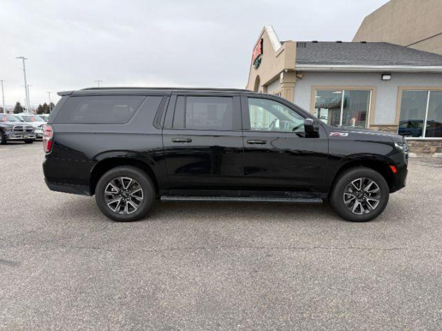 2022 Black /Jet Black Chevrolet Suburban (1GNSKDKDXNR) with an 53L V8 OHV 16V engine, Automatic transmission, located at 1175 N Woodruff Ave, Idaho Falls, ID, 83401, 43.506901, -111.999657 - This 2022 Chevrolet Suburban LT Z71, has the 5.3L V8 motor. It only has 35,683 miles. Comes with leather seats, both fronts seats are powered, heated seats, remote start, back up camera, lane assist, rear climate control, Bose stereo system, Running boards , and it has a towing package. **At Timberl - Photo#33