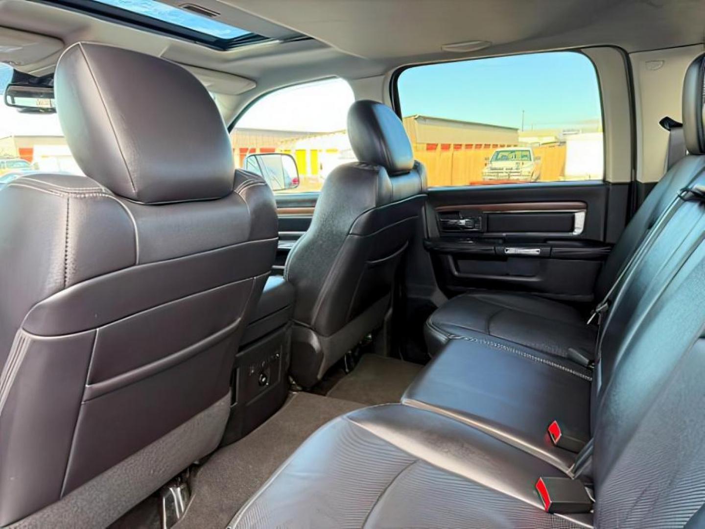 2016 BLACK /Black, leather Ram 2500 (3C6UR5FL1GG) with an 67L L6 OHV 24V TURBO DIESEL engine, Automatic transmission, located at 1175 N Woodruff Ave, Idaho Falls, ID, 83401, 43.506901, -111.999657 - At Timberline Auto, finding a great deal on your next vehicle is always easy! Our experienced sales staff's goal is to help find you the right vehicle at the right price! Our knowledgeable finance department has options for almost any credit score. We offer extended service contract options to prote - Photo#23