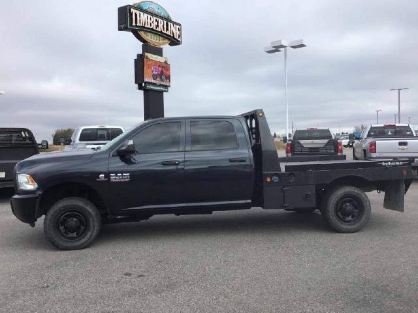 2016 GRAY /Black/Diesel Gray, cloth RAM 2500 Tradesman Crew Cab LWB 4WD (3C6UR5HL2GG) with an 6.7L L6 OHV 24V TURBO DIESEL engine, 6-Speed Automatic transmission, located at 1235 N Woodruff Ave., Idaho Falls, 83401, (208) 523-1053, 43.507172, -112.000488 - Photo#1