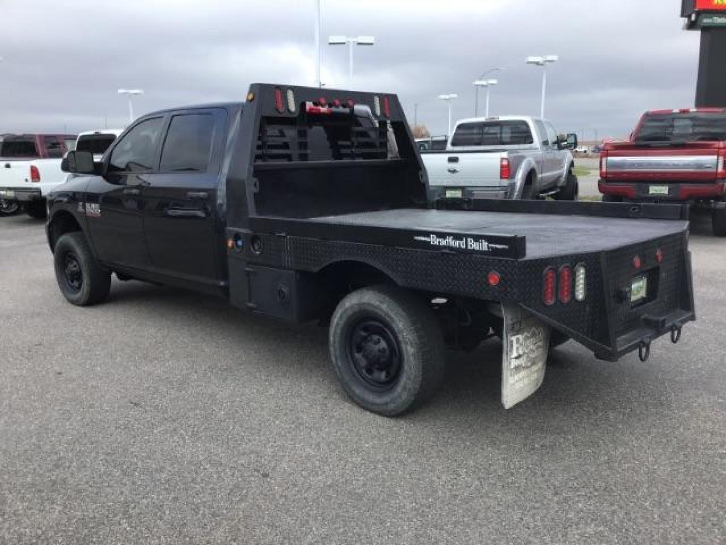 2016 GRAY /Black/Diesel Gray, cloth RAM 2500 Tradesman Crew Cab LWB 4WD (3C6UR5HL2GG) with an 6.7L L6 OHV 24V TURBO DIESEL engine, 6-Speed Automatic transmission, located at 1235 N Woodruff Ave., Idaho Falls, 83401, (208) 523-1053, 43.507172, -112.000488 - Photo#2