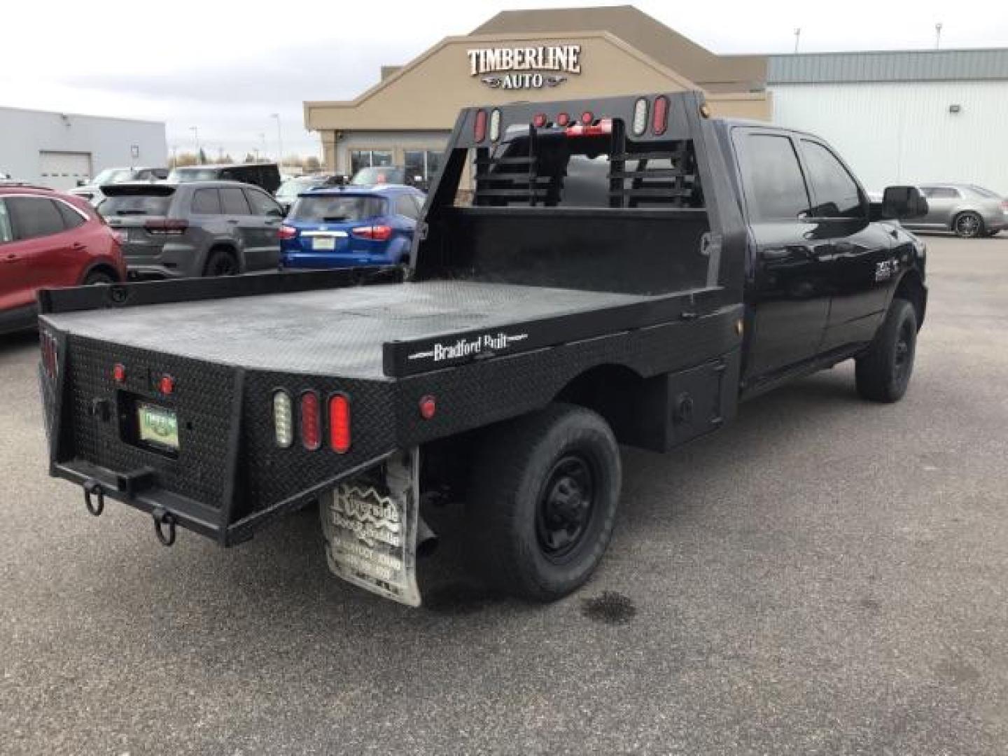 2016 GRAY /Black/Diesel Gray, cloth RAM 2500 Tradesman Crew Cab LWB 4WD (3C6UR5HL2GG) with an 6.7L L6 OHV 24V TURBO DIESEL engine, 6-Speed Automatic transmission, located at 1235 N Woodruff Ave., Idaho Falls, 83401, (208) 523-1053, 43.507172, -112.000488 - Photo#4