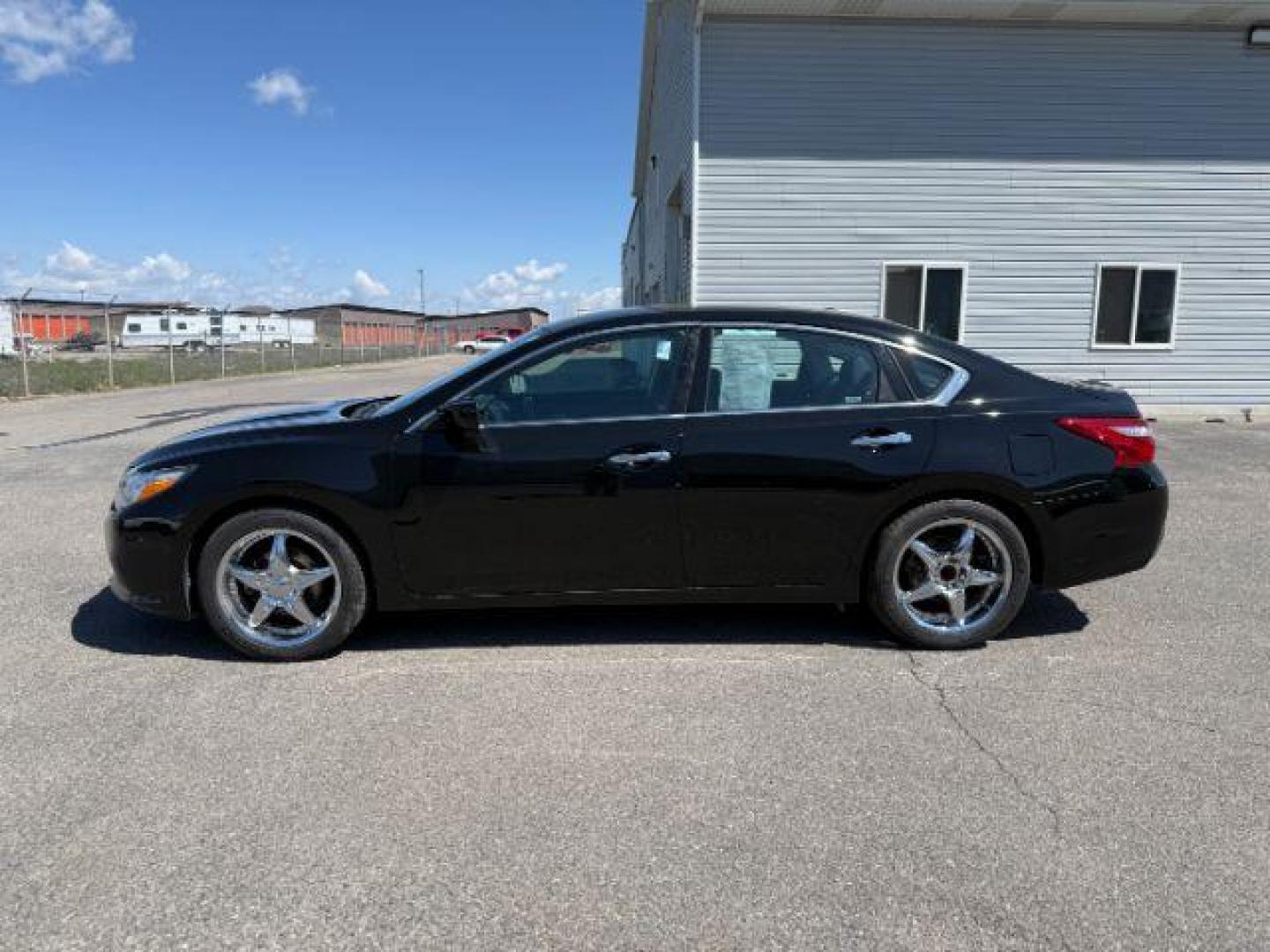 2017 BLACK /BLACK Nissan Altima 2.5 SV (1N4AL3AP4HN) with an 2.5 engine, AUTOMATIC transmission, located at 1235 N Woodruff Ave., Idaho Falls, 83401, (208) 523-1053, 43.507172, -112.000488 - At Timberline Auto, finding a great deal on your next vehicle is always easy! Our experienced sales staff's goal is to help find you the right vehicle at the right price! Our knowledgeable finance department has options for almost any credit score. We offer extended service contract options to prote - Photo#1