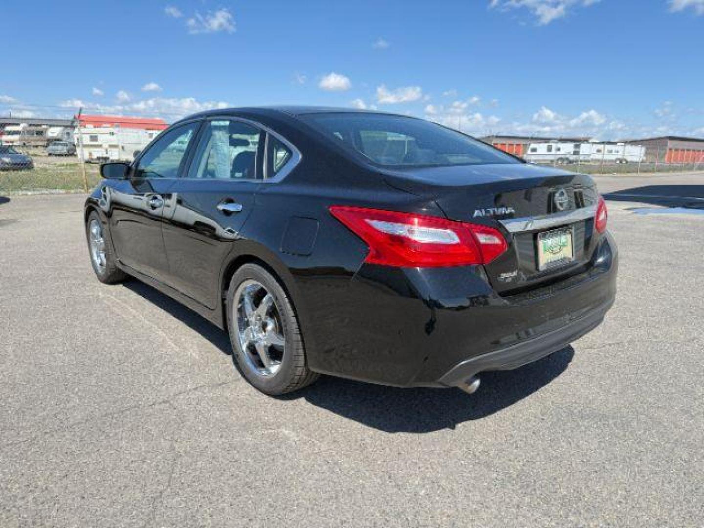 2017 BLACK /BLACK Nissan Altima 2.5 SV (1N4AL3AP4HN) with an 2.5 engine, AUTOMATIC transmission, located at 1235 N Woodruff Ave., Idaho Falls, 83401, (208) 523-1053, 43.507172, -112.000488 - At Timberline Auto, finding a great deal on your next vehicle is always easy! Our experienced sales staff's goal is to help find you the right vehicle at the right price! Our knowledgeable finance department has options for almost any credit score. We offer extended service contract options to prote - Photo#2