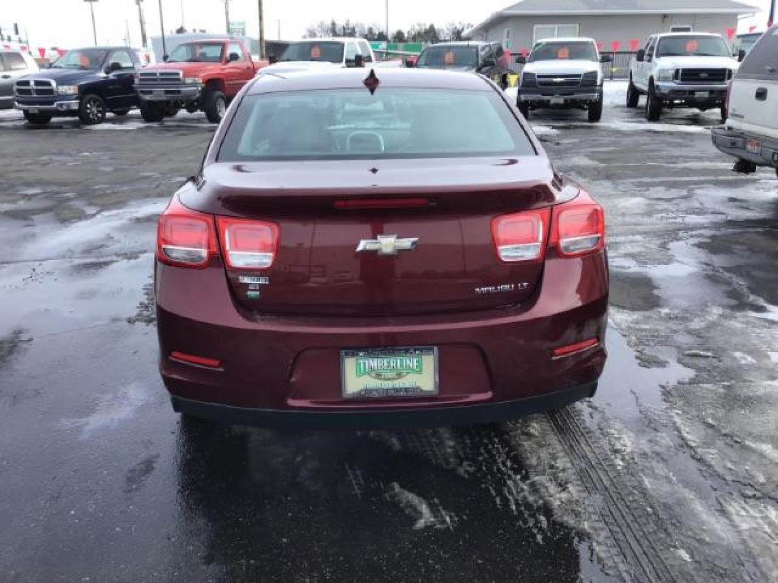 2015 Butte Red Metallic /Jet Black Chevrolet Malibu 2LT (1G11D5SL5FF) with an 2.5L L4 DOHC 16V engine, 6-Speed Automatic transmission, located at 1235 N Woodruff Ave., Idaho Falls, 83401, (208) 523-1053, 43.507172, -112.000488 - This 2015 Chevrolet Malibu 2LT, has 134,000 miles. Comes with Leather interior, heated seats, power seats, blue tooth audio, touch screen stereo, and back up camera. At Timberline Auto it is always easy to find a great deal on your next vehicle! Our experienced sales staff can help find the right v - Photo #3