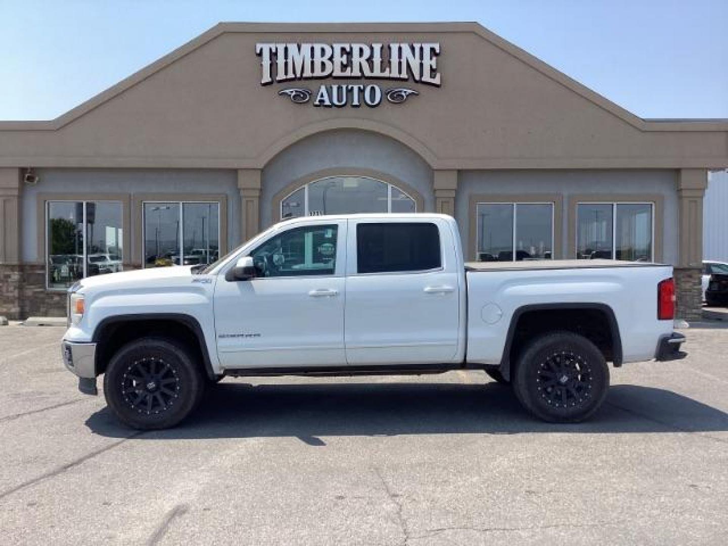 2015 Summit White /Jet Black, cloth GMC Sierra 1500 SLE Crew Cab Short Box 4WD (3GTU2UEC3FG) with an 5.3L V8 OHV 16V engine, 6-Speed Automatic transmission, located at 1235 N Woodruff Ave., Idaho Falls, 83401, (208) 523-1053, 43.507172, -112.000488 - New Inventory. Going thru service and inspection. Call for more pictures. At Timberline Auto it is always easy to find a great deal on your next vehicle! Our experienced sales staff can help find the right vehicle that will fit your needs. Our knowledgeable finance department has options for almost - Photo#2