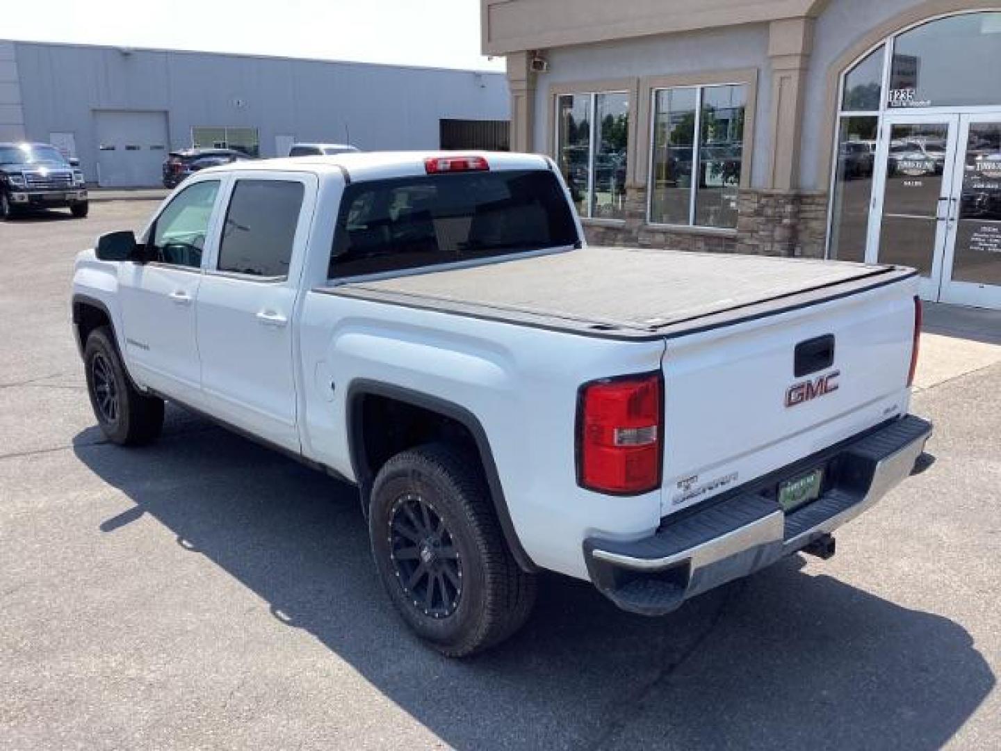 2015 Summit White /Jet Black, cloth GMC Sierra 1500 SLE Crew Cab Short Box 4WD (3GTU2UEC3FG) with an 5.3L V8 OHV 16V engine, 6-Speed Automatic transmission, located at 1235 N Woodruff Ave., Idaho Falls, 83401, (208) 523-1053, 43.507172, -112.000488 - New Inventory. Going thru service and inspection. Call for more pictures. At Timberline Auto it is always easy to find a great deal on your next vehicle! Our experienced sales staff can help find the right vehicle that will fit your needs. Our knowledgeable finance department has options for almost - Photo#3