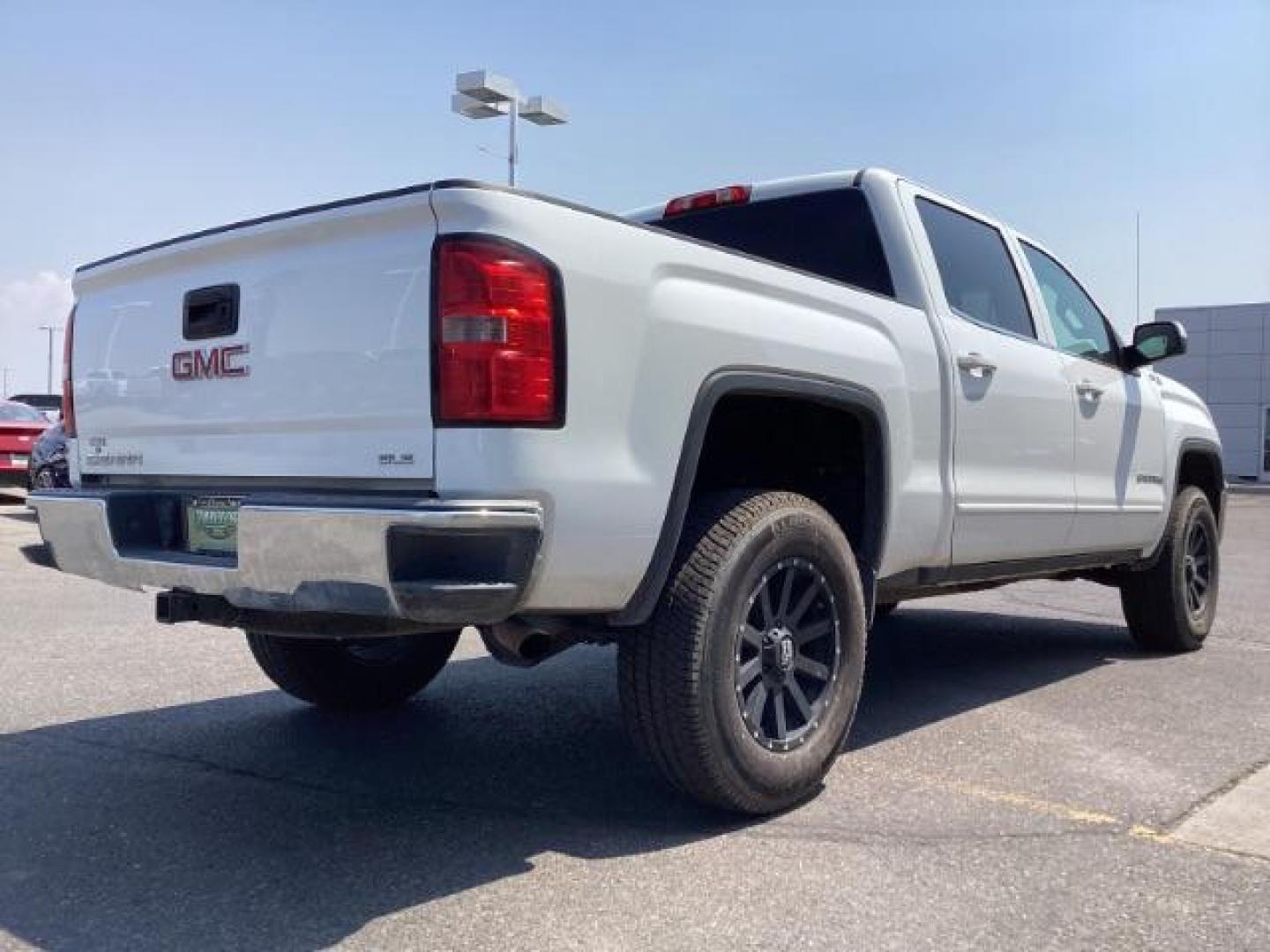 2015 Summit White /Jet Black, cloth GMC Sierra 1500 SLE Crew Cab Short Box 4WD (3GTU2UEC3FG) with an 5.3L V8 OHV 16V engine, 6-Speed Automatic transmission, located at 1235 N Woodruff Ave., Idaho Falls, 83401, (208) 523-1053, 43.507172, -112.000488 - New Inventory. Going thru service and inspection. Call for more pictures. At Timberline Auto it is always easy to find a great deal on your next vehicle! Our experienced sales staff can help find the right vehicle that will fit your needs. Our knowledgeable finance department has options for almost - Photo#6