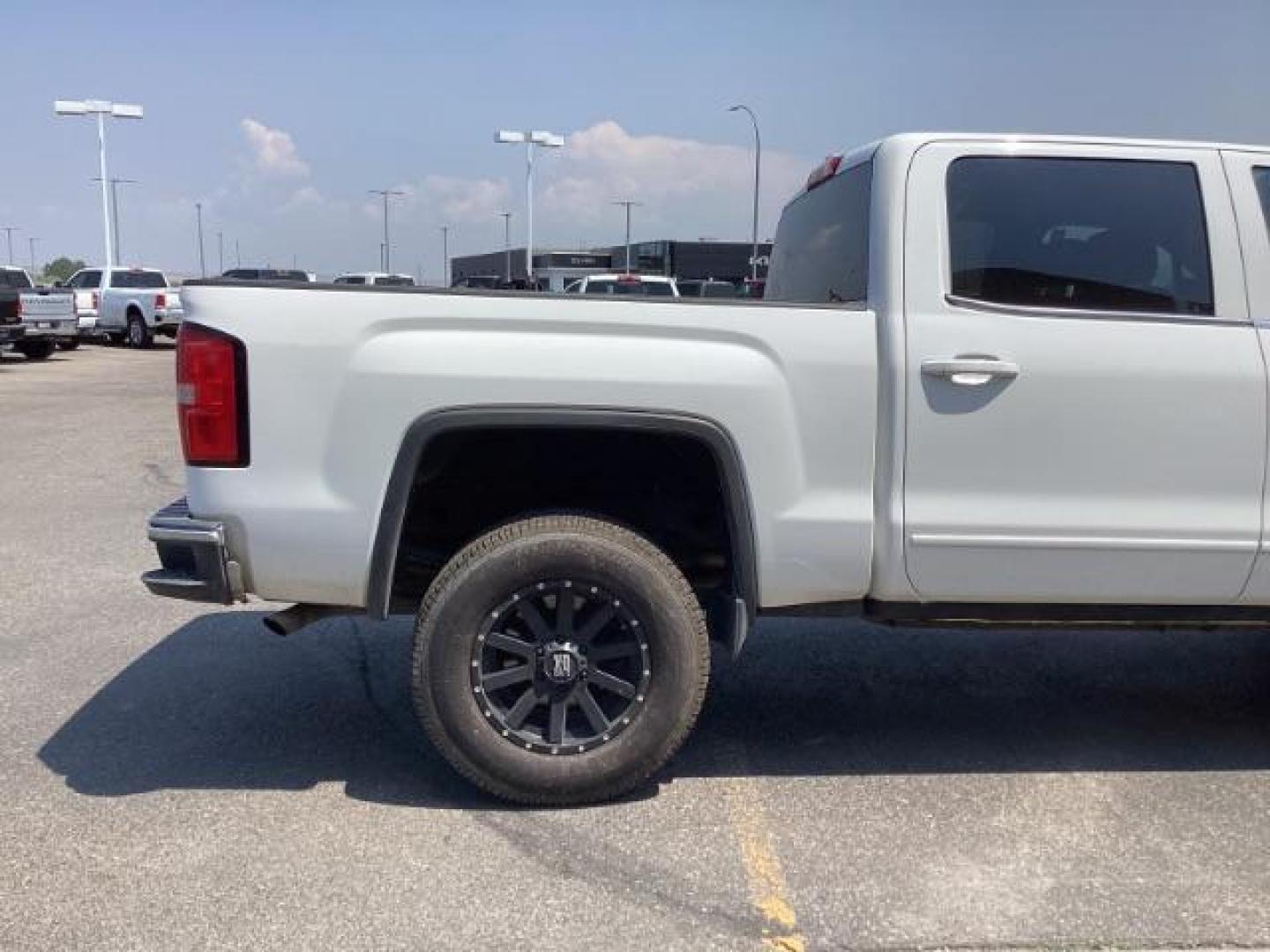 2015 Summit White /Jet Black, cloth GMC Sierra 1500 SLE Crew Cab Short Box 4WD (3GTU2UEC3FG) with an 5.3L V8 OHV 16V engine, 6-Speed Automatic transmission, located at 1235 N Woodruff Ave., Idaho Falls, 83401, (208) 523-1053, 43.507172, -112.000488 - New Inventory. Going thru service and inspection. Call for more pictures. At Timberline Auto it is always easy to find a great deal on your next vehicle! Our experienced sales staff can help find the right vehicle that will fit your needs. Our knowledgeable finance department has options for almost - Photo#7