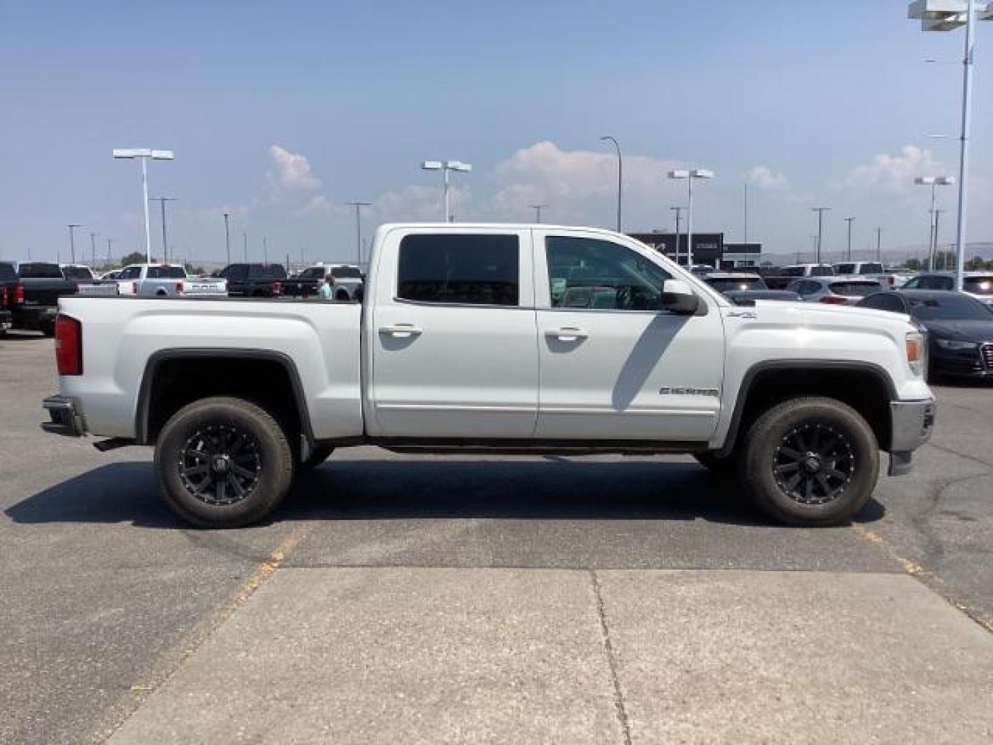 2015 Summit White /Jet Black, cloth GMC Sierra 1500 SLE Crew Cab Short Box 4WD (3GTU2UEC3FG) with an 5.3L V8 OHV 16V engine, 6-Speed Automatic transmission, located at 1235 N Woodruff Ave., Idaho Falls, 83401, (208) 523-1053, 43.507172, -112.000488 - New Inventory. Going thru service and inspection. Call for more pictures. At Timberline Auto it is always easy to find a great deal on your next vehicle! Our experienced sales staff can help find the right vehicle that will fit your needs. Our knowledgeable finance department has options for almost - Photo#8