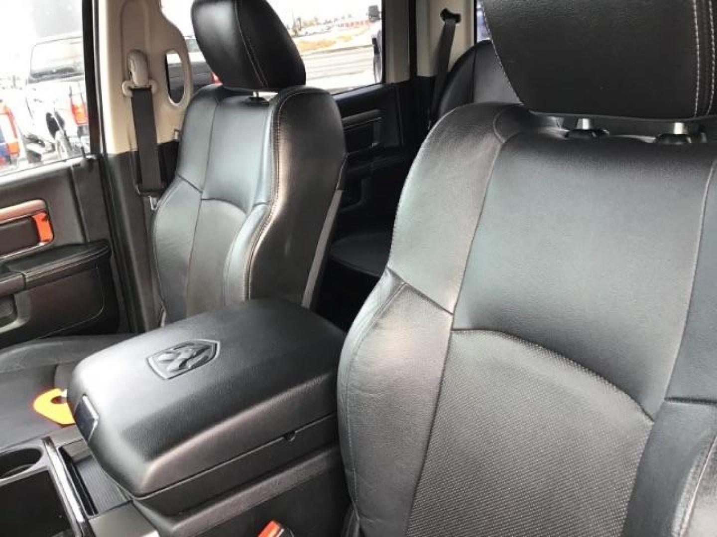 2014 Bright White Clearcoat /Black RAM 1500 Sport Crew Cab LWB 4WD (1C6RR7UT5ES) with an 5.7L V8 OHV 16V engine, 8-Speed Automatic transmission, located at 1235 N Woodruff Ave., Idaho Falls, 83401, (208) 523-1053, 43.507172, -112.000488 - Photo#9