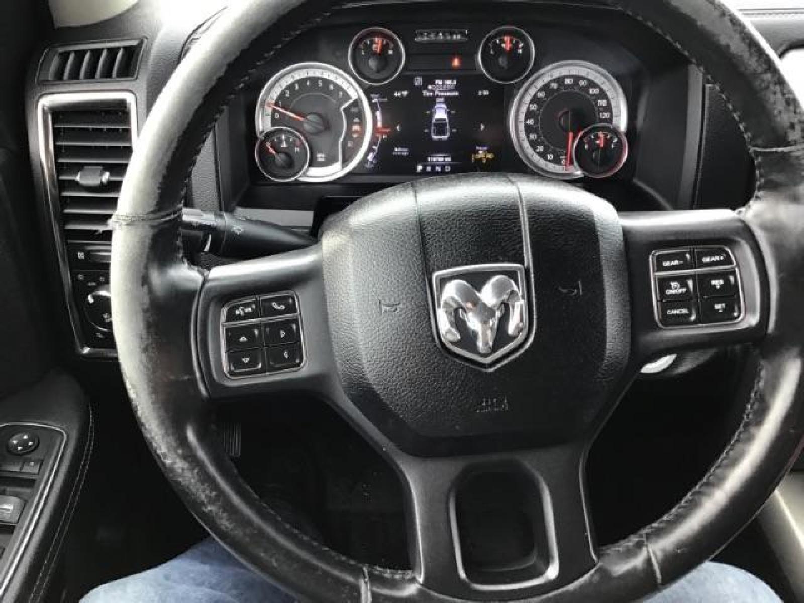 2014 Bright White Clearcoat /Black RAM 1500 Sport Crew Cab LWB 4WD (1C6RR7UT5ES) with an 5.7L V8 OHV 16V engine, 8-Speed Automatic transmission, located at 1235 N Woodruff Ave., Idaho Falls, 83401, (208) 523-1053, 43.507172, -112.000488 - This 2014 Ram 1500 Sport 4x4, has the 5.7L Hemi motor. It has 115,000 miles. Comes with leather interior, heated and cooled seats, power seats, blue tooth audio, back up camera, and power windows and locks. At Timberline Auto it is always easy to find a great deal on your next vehicle! Our experienc - Photo #14