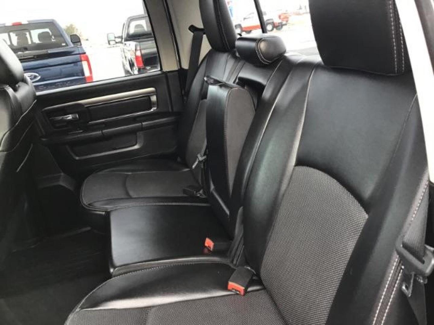 2014 Bright White Clearcoat /Black RAM 1500 Sport Crew Cab LWB 4WD (1C6RR7UT5ES) with an 5.7L V8 OHV 16V engine, 8-Speed Automatic transmission, located at 1235 N Woodruff Ave., Idaho Falls, 83401, (208) 523-1053, 43.507172, -112.000488 - Photo#18