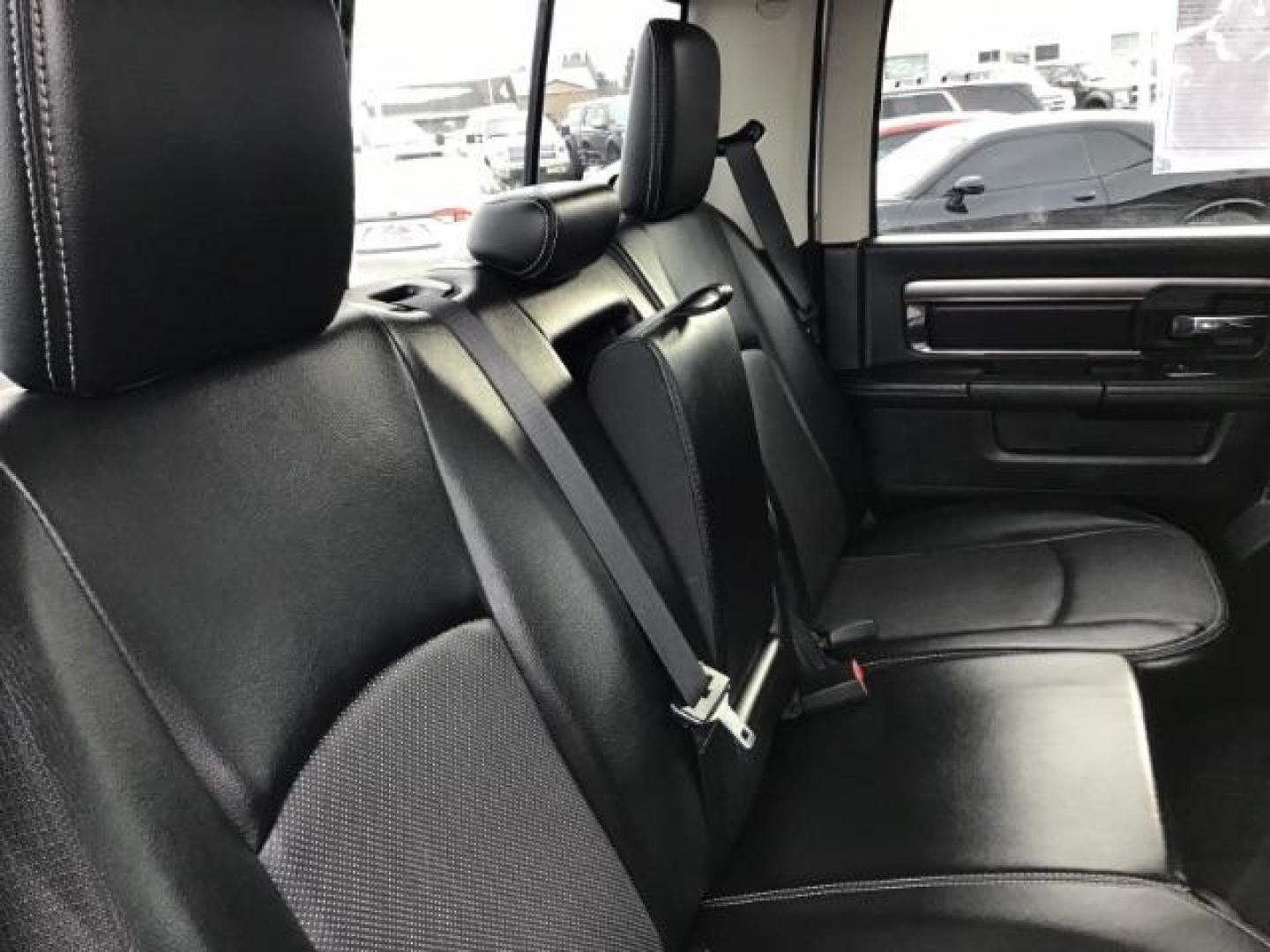 2014 Bright White Clearcoat /Black RAM 1500 Sport Crew Cab LWB 4WD (1C6RR7UT5ES) with an 5.7L V8 OHV 16V engine, 8-Speed Automatic transmission, located at 1235 N Woodruff Ave., Idaho Falls, 83401, (208) 523-1053, 43.507172, -112.000488 - Photo#20