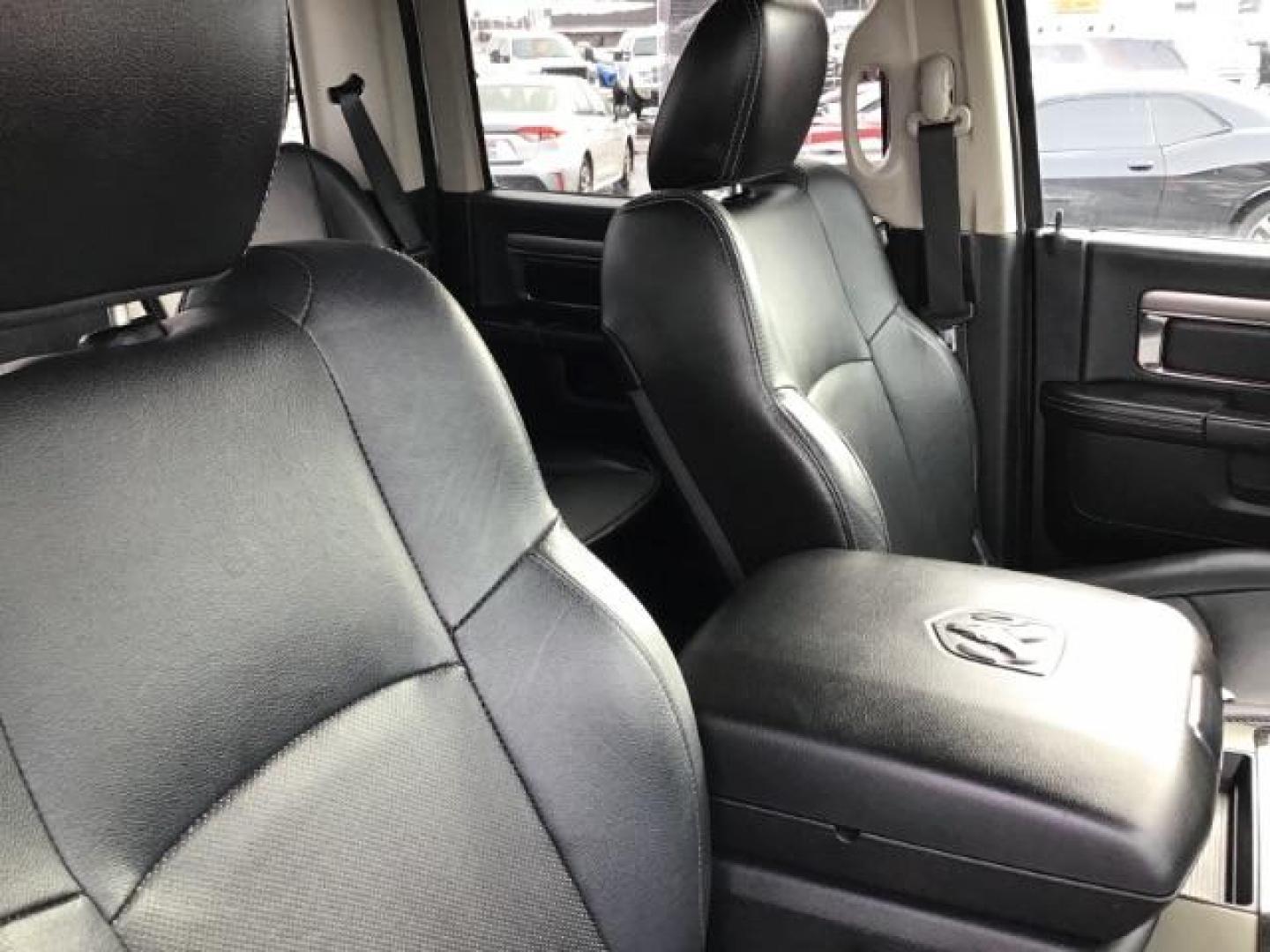 2014 Bright White Clearcoat /Black RAM 1500 Sport Crew Cab LWB 4WD (1C6RR7UT5ES) with an 5.7L V8 OHV 16V engine, 8-Speed Automatic transmission, located at 1235 N Woodruff Ave., Idaho Falls, 83401, (208) 523-1053, 43.507172, -112.000488 - Photo#22