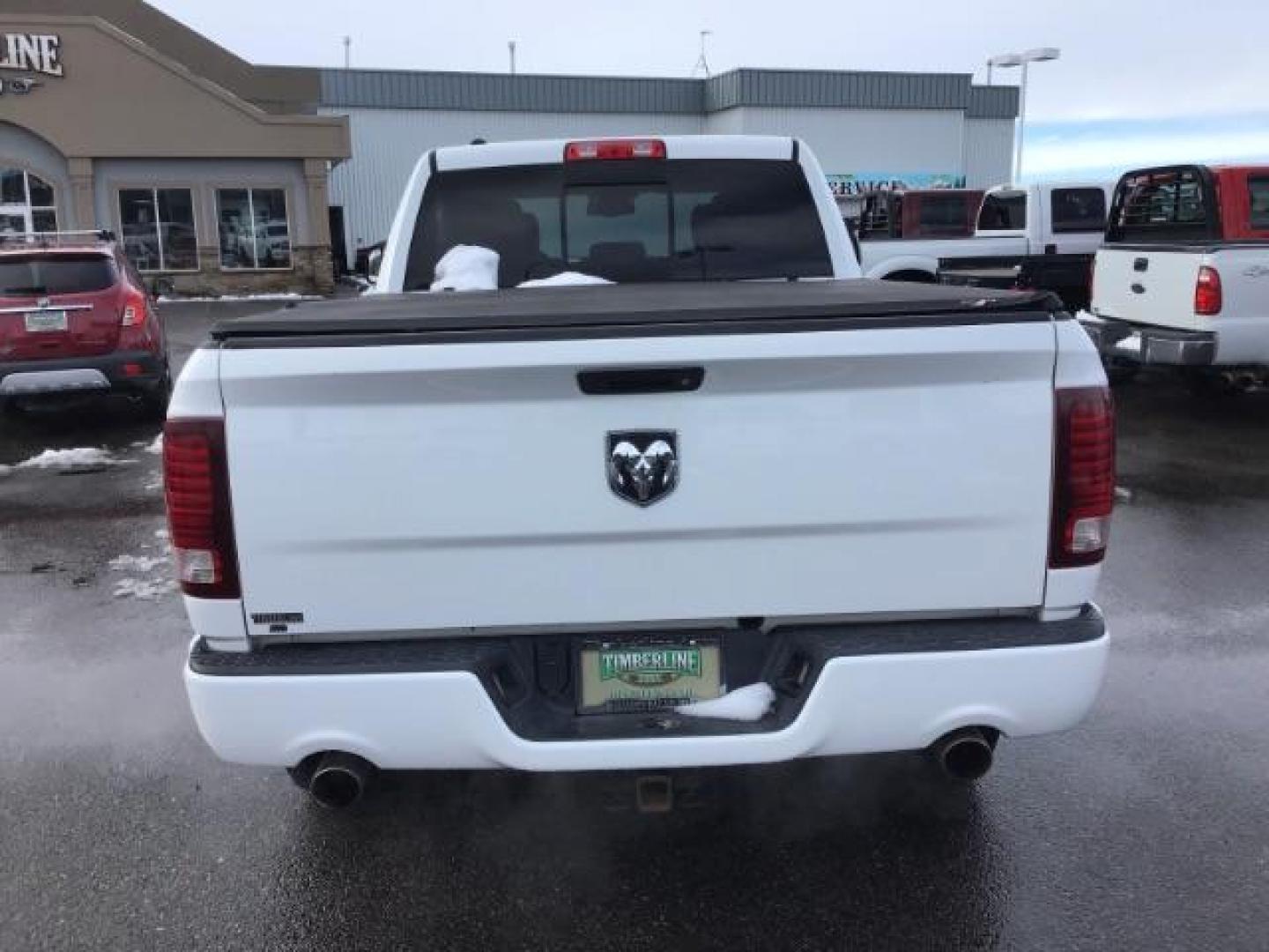 2014 Bright White Clearcoat /Black RAM 1500 Sport Crew Cab LWB 4WD (1C6RR7UT5ES) with an 5.7L V8 OHV 16V engine, 8-Speed Automatic transmission, located at 1235 N Woodruff Ave., Idaho Falls, 83401, (208) 523-1053, 43.507172, -112.000488 - Photo#3