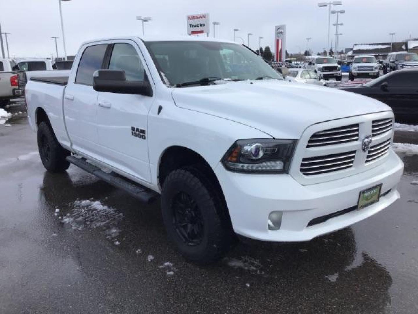 2014 Bright White Clearcoat /Black RAM 1500 Sport Crew Cab LWB 4WD (1C6RR7UT5ES) with an 5.7L V8 OHV 16V engine, 8-Speed Automatic transmission, located at 1235 N Woodruff Ave., Idaho Falls, 83401, (208) 523-1053, 43.507172, -112.000488 - Photo#6