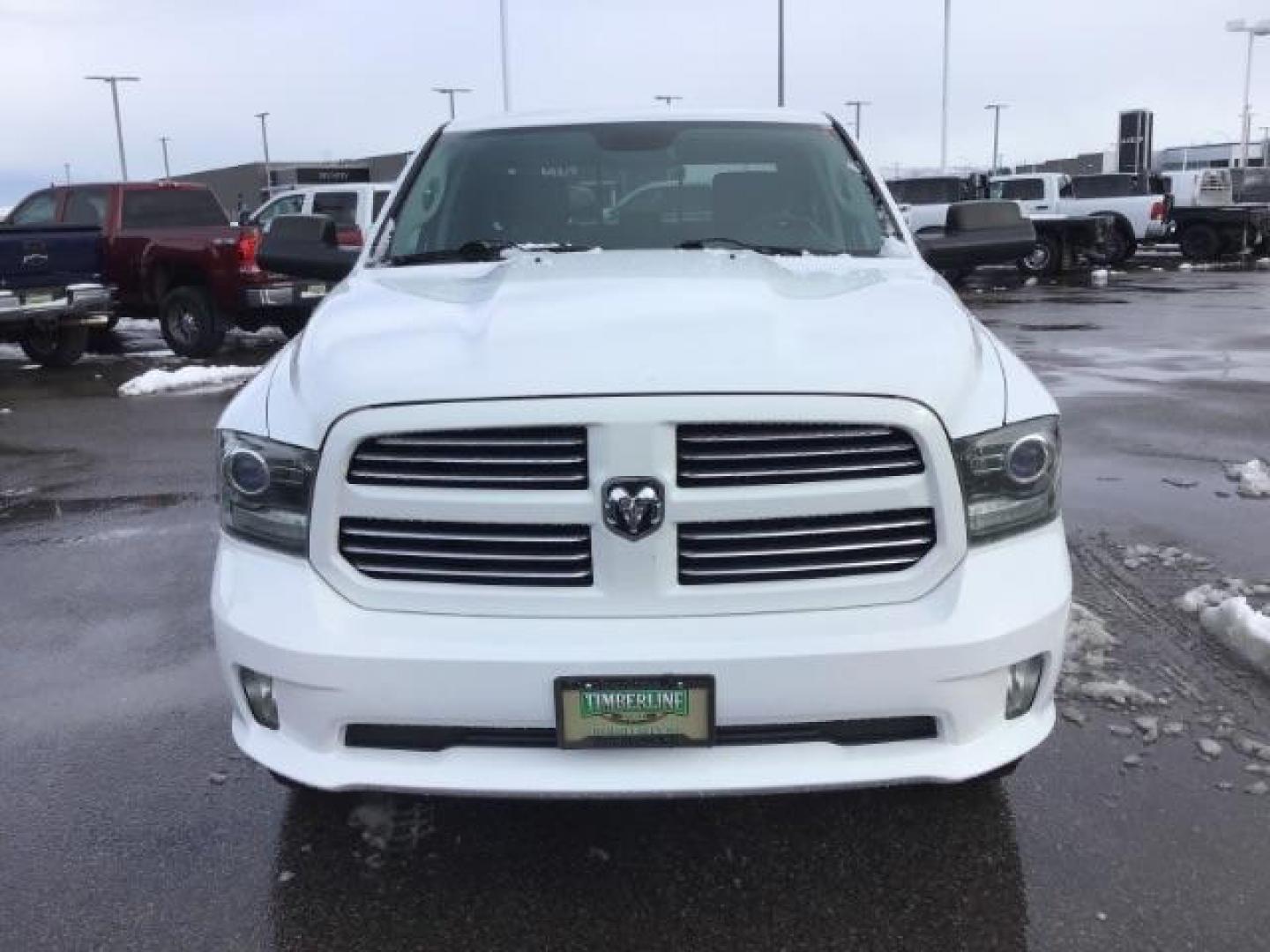 2014 Bright White Clearcoat /Black RAM 1500 Sport Crew Cab LWB 4WD (1C6RR7UT5ES) with an 5.7L V8 OHV 16V engine, 8-Speed Automatic transmission, located at 1235 N Woodruff Ave., Idaho Falls, 83401, (208) 523-1053, 43.507172, -112.000488 - Photo#7