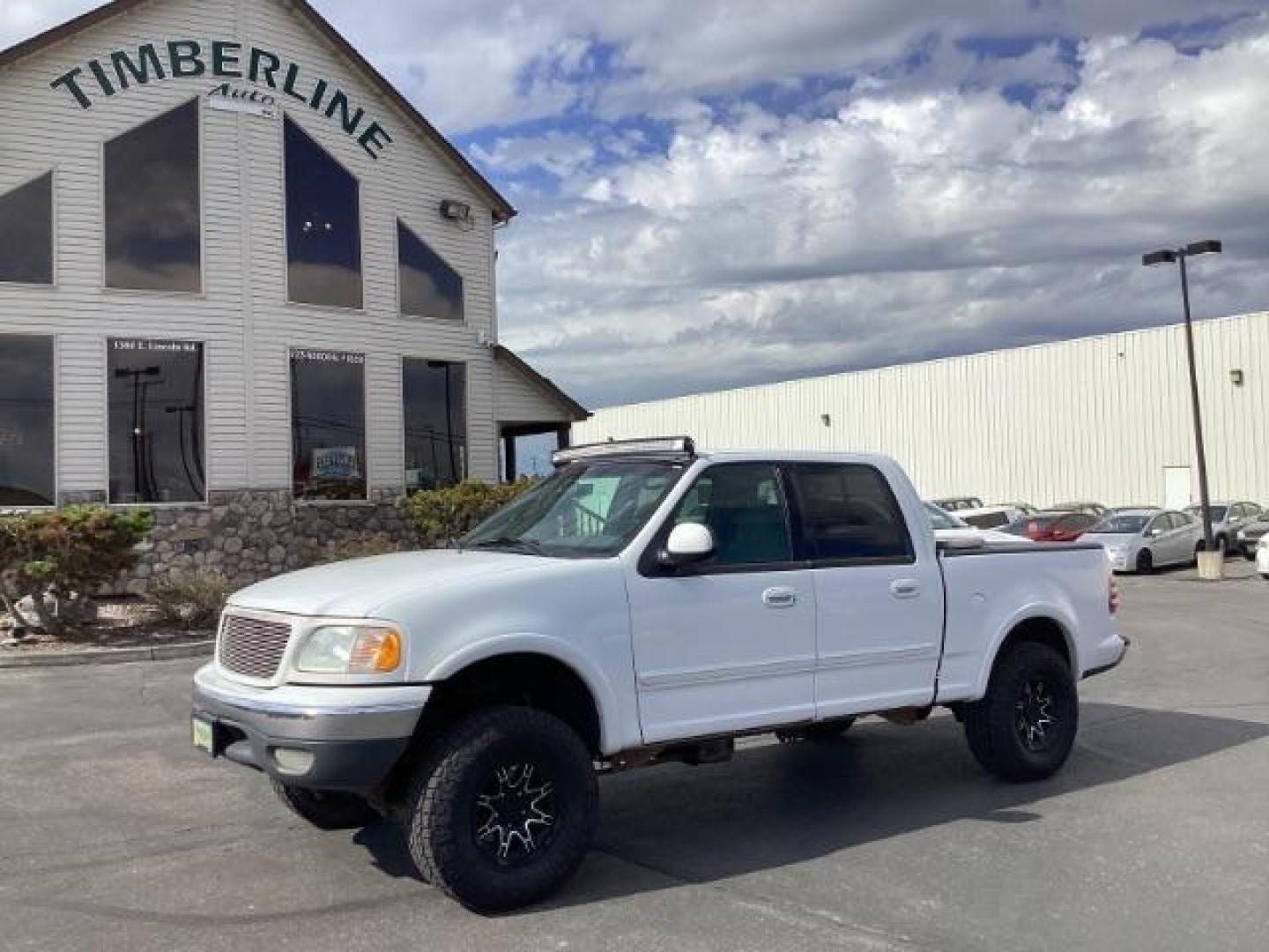 2001 WHITE /Medium Graphite Cloth Ford F-150 XLT SuperCrew 4WD (1FTRW08L51K) with an 5.4L V8 SOHC 16V engine, 4-Speed Automatic transmission, located at 1235 N Woodruff Ave., Idaho Falls, 83401, (208) 523-1053, 43.507172, -112.000488 - Photo#1