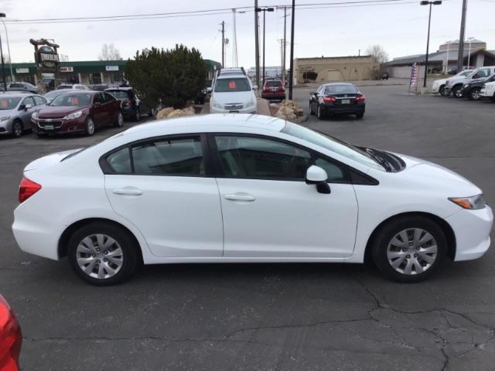 2012 Taffeta White /Gray Cloth Interior Honda Civic LX Sedan 5-Speed AT (19XFB2F54CE) with an 1.8L L4 SOHC 16V engine, 5-Speed Automatic transmission, located at 1235 N Woodruff Ave., Idaho Falls, 83401, (208) 523-1053, 43.507172, -112.000488 - Photo #5