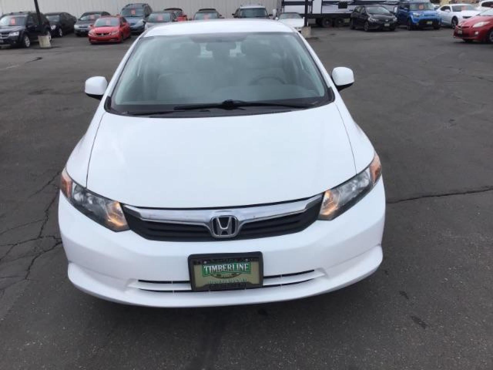 2012 Taffeta White /Gray Cloth Interior Honda Civic LX Sedan 5-Speed AT (19XFB2F54CE) with an 1.8L L4 SOHC 16V engine, 5-Speed Automatic transmission, located at 1235 N Woodruff Ave., Idaho Falls, 83401, (208) 523-1053, 43.507172, -112.000488 - Photo #7