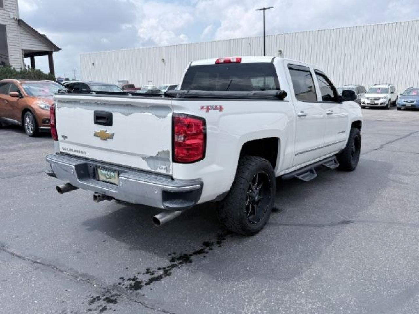 2014 WHITE /LEATHER Chevrolet Silverado 1500 (3GCUKSEC2EG) with an 53L V8 VORTEC engine, Automatic transmission, located at 1175 N Woodruff Ave, Idaho Falls, ID, 83401, 43.506901, -111.999657 - Strong V8 performance and full size truck utility come together in this 2014 Chevrolet Silverado 1500 Crew Cab 4x4 powered by a 5.3L EcoTec3 V8 engine. Built on Chevrolet's proven half ton platform, this Silverado delivers the capability needed for towing, hauling, and everyday work or travel demand- Photo#31