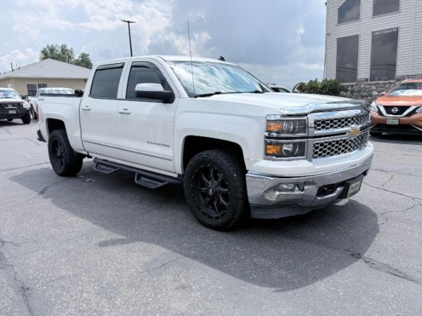 2014 WHITE /LEATHER Chevrolet Silverado 1500 (3GCUKSEC2EG) with an 53L V8 VORTEC engine, Automatic transmission, located at 1175 N Woodruff Ave, Idaho Falls, ID, 83401, 43.506901, -111.999657 - Strong V8 performance and full size truck utility come together in this 2014 Chevrolet Silverado 1500 Crew Cab 4x4 powered by a 5.3L EcoTec3 V8 engine. Built on Chevrolet's proven half ton platform, this Silverado delivers the capability needed for towing, hauling, and everyday work or travel demand- Photo#33
