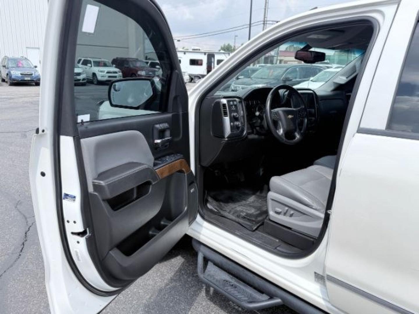 2014 WHITE /LEATHER Chevrolet Silverado 1500 (3GCUKSEC2EG) with an 53L V8 VORTEC engine, Automatic transmission, located at 1175 N Woodruff Ave, Idaho Falls, ID, 83401, 43.506901, -111.999657 - Strong V8 performance and full size truck utility come together in this 2014 Chevrolet Silverado 1500 Crew Cab 4x4 powered by a 5.3L EcoTec3 V8 engine. Built on Chevrolet's proven half ton platform, this Silverado delivers the capability needed for towing, hauling, and everyday work or travel demand- Photo#37