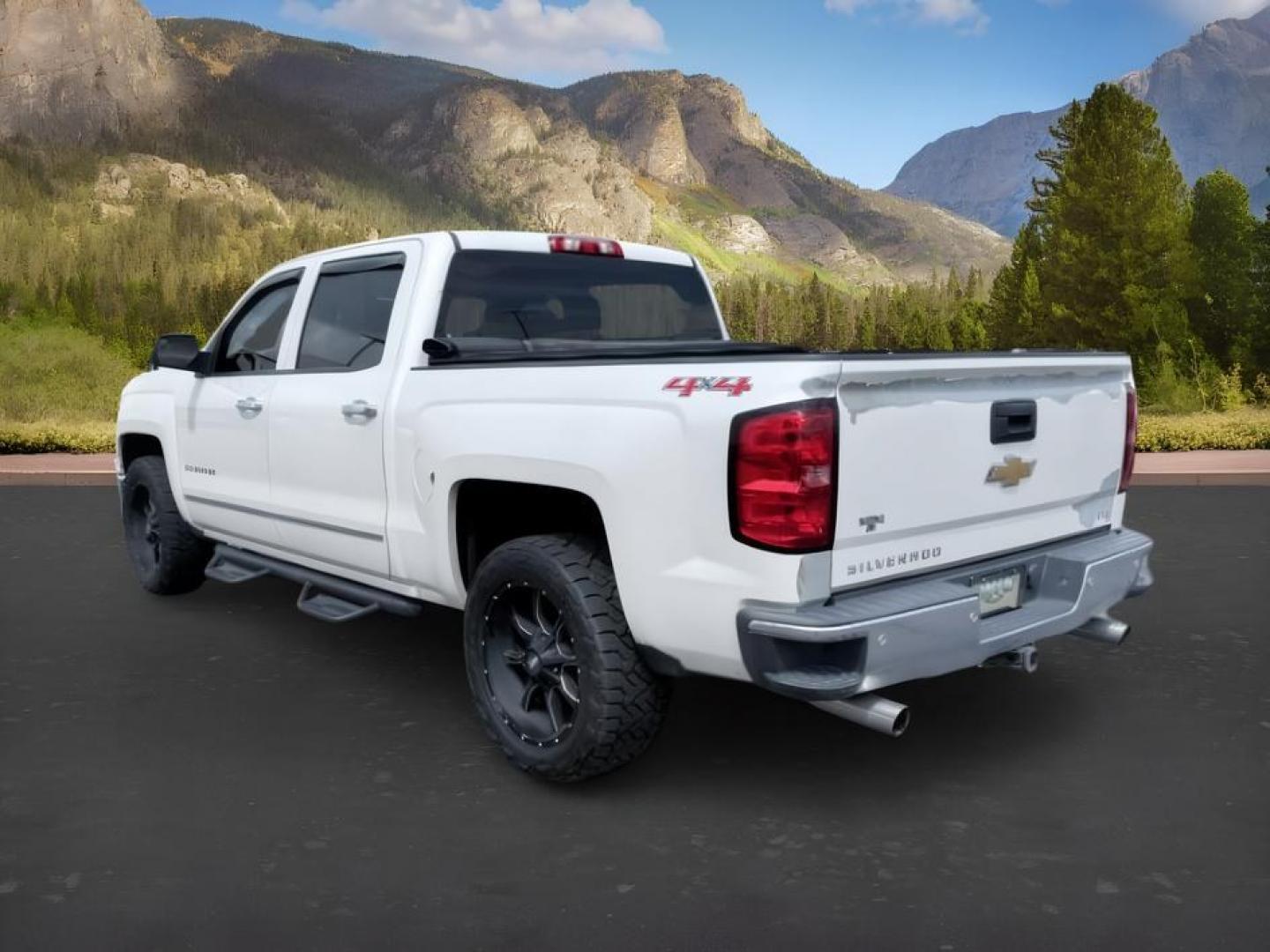 2014 WHITE /LEATHER Chevrolet Silverado 1500 (3GCUKSEC2EG) with an 53L V8 VORTEC engine, Automatic transmission, located at 1175 N Woodruff Ave, Idaho Falls, ID, 83401, 43.506901, -111.999657 - Strong V8 performance and full size truck utility come together in this 2014 Chevrolet Silverado 1500 Crew Cab 4x4 powered by a 5.3L EcoTec3 V8 engine. Built on Chevrolet's proven half ton platform, this Silverado delivers the capability needed for towing, hauling, and everyday work or travel demand- Photo#2