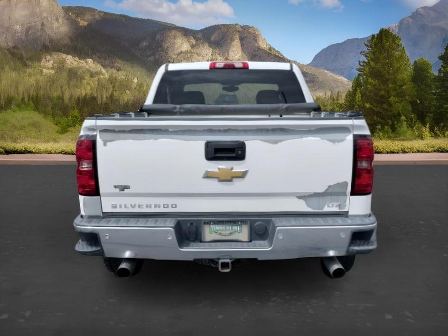 2014 WHITE /LEATHER Chevrolet Silverado 1500 (3GCUKSEC2EG) with an 53L V8 VORTEC engine, Automatic transmission, located at 1175 N Woodruff Ave, Idaho Falls, ID, 83401, 43.506901, -111.999657 - Strong V8 performance and full size truck utility come together in this 2014 Chevrolet Silverado 1500 Crew Cab 4x4 powered by a 5.3L EcoTec3 V8 engine. Built on Chevrolet's proven half ton platform, this Silverado delivers the capability needed for towing, hauling, and everyday work or travel demand- Photo#3