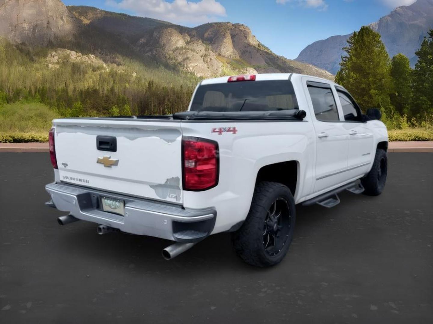 2014 WHITE /LEATHER Chevrolet Silverado 1500 (3GCUKSEC2EG) with an 53L V8 VORTEC engine, Automatic transmission, located at 1175 N Woodruff Ave, Idaho Falls, ID, 83401, 43.506901, -111.999657 - Strong V8 performance and full size truck utility come together in this 2014 Chevrolet Silverado 1500 Crew Cab 4x4 powered by a 5.3L EcoTec3 V8 engine. Built on Chevrolet's proven half ton platform, this Silverado delivers the capability needed for towing, hauling, and everyday work or travel demand- Photo#4