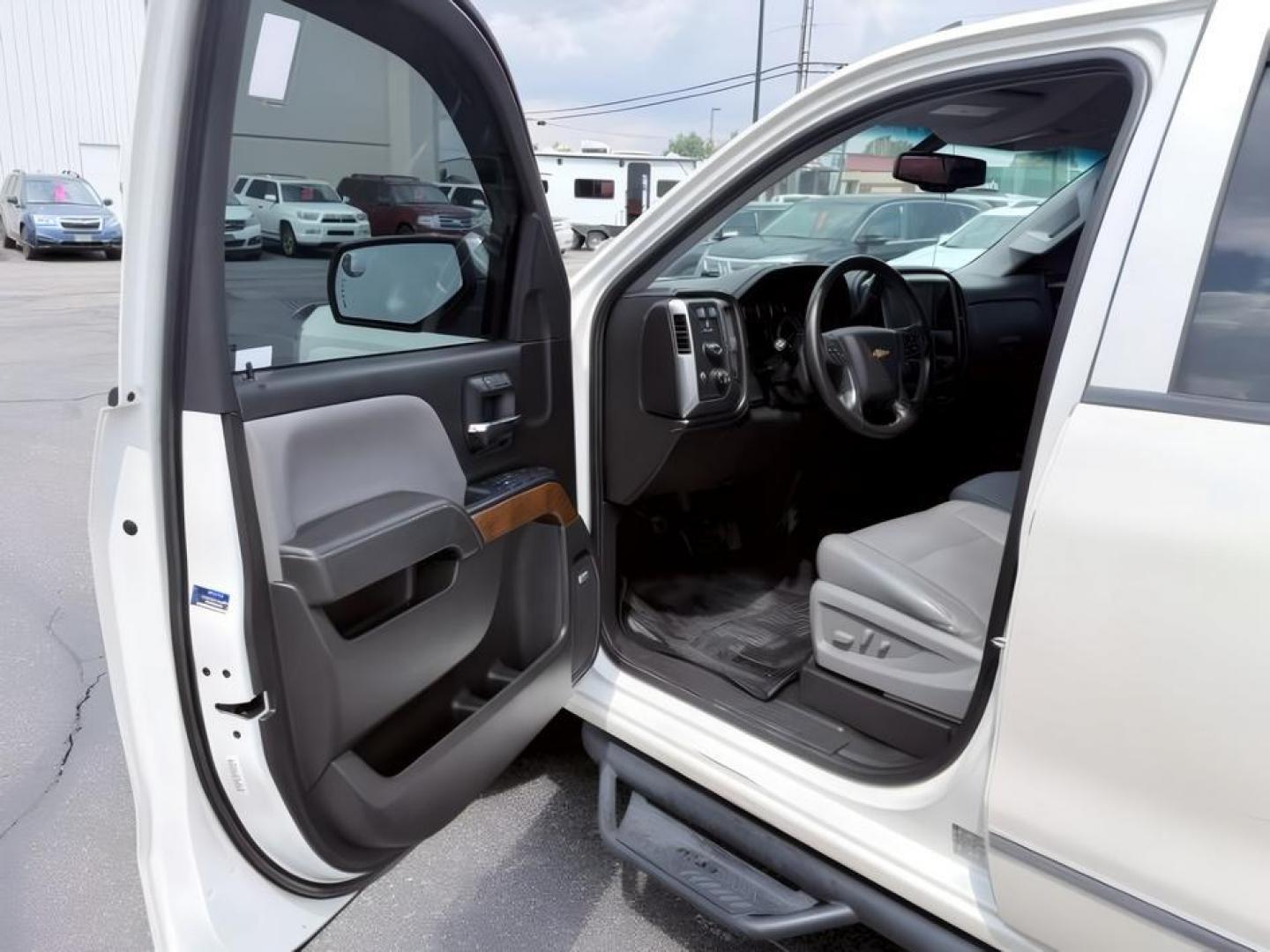 2014 WHITE /LEATHER Chevrolet Silverado 1500 (3GCUKSEC2EG) with an 53L V8 VORTEC engine, Automatic transmission, located at 1175 N Woodruff Ave, Idaho Falls, ID, 83401, 43.506901, -111.999657 - Strong V8 performance and full size truck utility come together in this 2014 Chevrolet Silverado 1500 Crew Cab 4x4 powered by a 5.3L EcoTec3 V8 engine. Built on Chevrolet's proven half ton platform, this Silverado delivers the capability needed for towing, hauling, and everyday work or travel demand- Photo#10