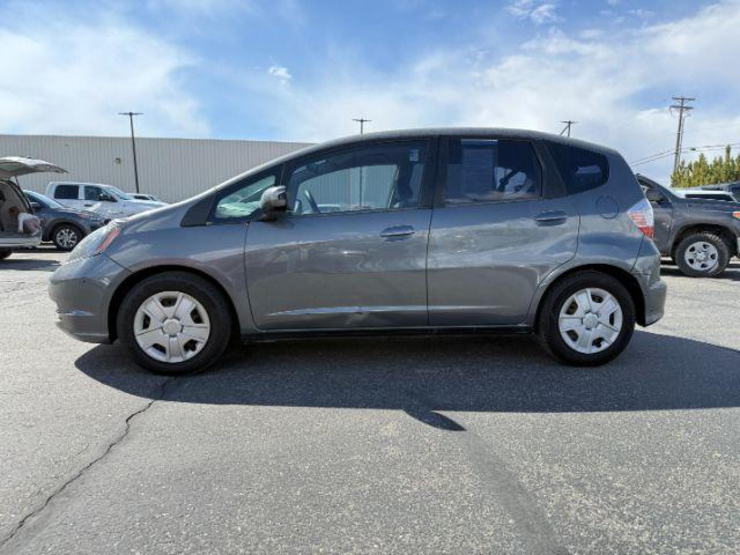 2013 GRAY /Gray Cloth Interior Honda Fit 5-Speed AT (JHMGE8H34DC) with an 1.5L L4 SOHC 16V engine, 5-Speed Automatic transmission, located at 1235 N Woodruff Ave., Idaho Falls, 83401, (208) 523-1053, 43.507172, -112.000488 - At Timberline Auto, finding a great deal on your next vehicle is always easy! Our experienced sales staff's goal is to help find you the right vehicle at the right price! Our knowledgeable finance department has options for almost any credit score. We offer extended service contract options to prote - Photo#1