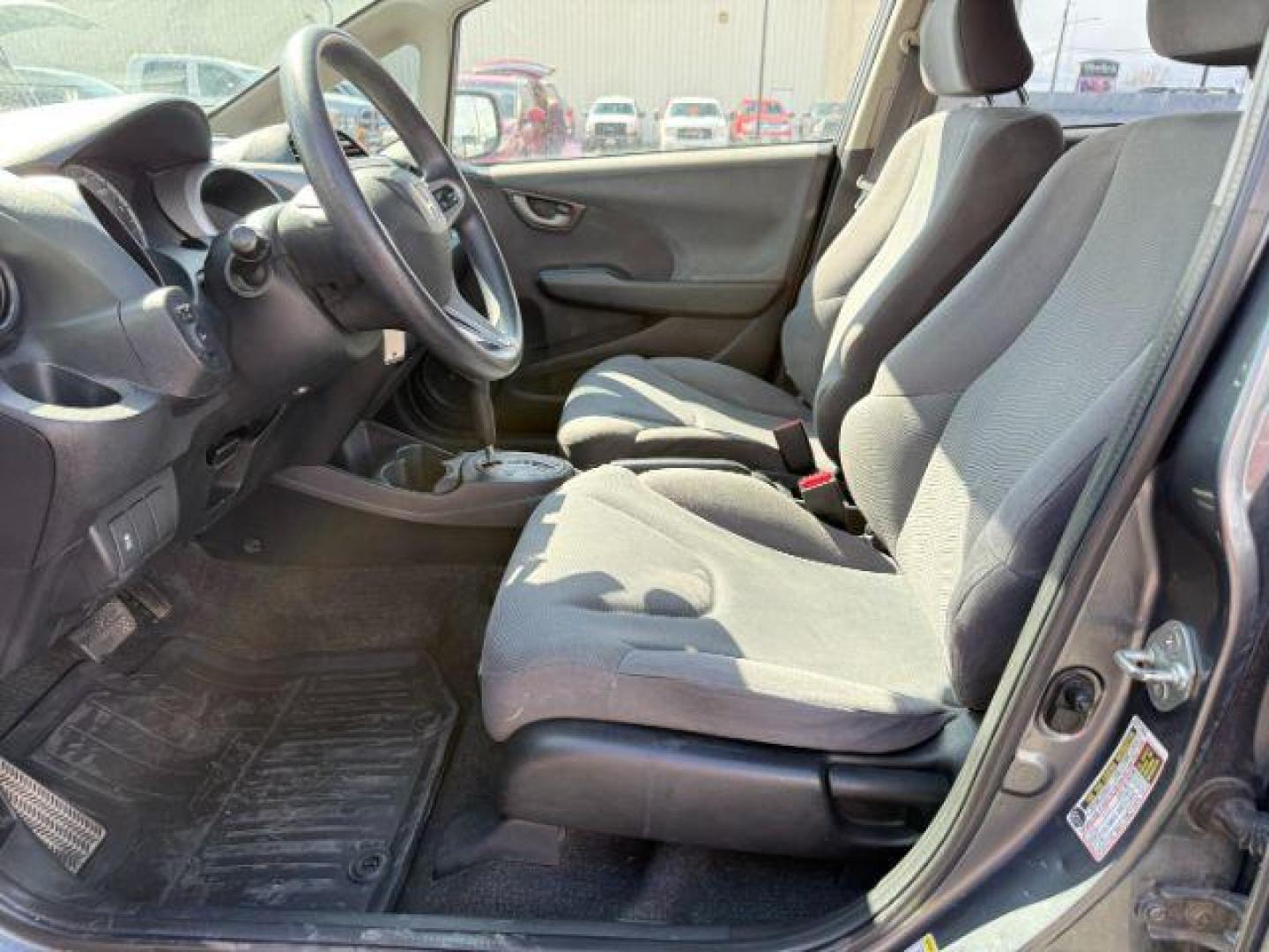 2013 GRAY /Gray Cloth Interior Honda Fit 5-Speed AT (JHMGE8H34DC) with an 1.5L L4 SOHC 16V engine, 5-Speed Automatic transmission, located at 1235 N Woodruff Ave., Idaho Falls, 83401, (208) 523-1053, 43.507172, -112.000488 - At Timberline Auto, finding a great deal on your next vehicle is always easy! Our experienced sales staff's goal is to help find you the right vehicle at the right price! Our knowledgeable finance department has options for almost any credit score. We offer extended service contract options to prote - Photo#9