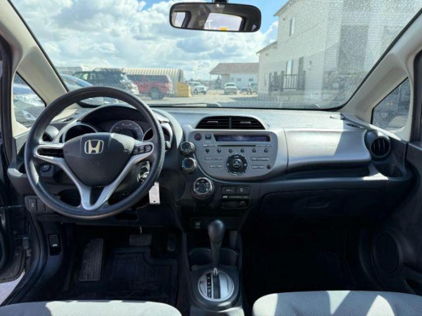 2013 GRAY /Gray Cloth Interior Honda Fit 5-Speed AT (JHMGE8H34DC) with an 1.5L L4 SOHC 16V engine, 5-Speed Automatic transmission, located at 1235 N Woodruff Ave., Idaho Falls, 83401, (208) 523-1053, 43.507172, -112.000488 - At Timberline Auto, finding a great deal on your next vehicle is always easy! Our experienced sales staff's goal is to help find you the right vehicle at the right price! Our knowledgeable finance department has options for almost any credit score. We offer extended service contract options to prote - Photo#14