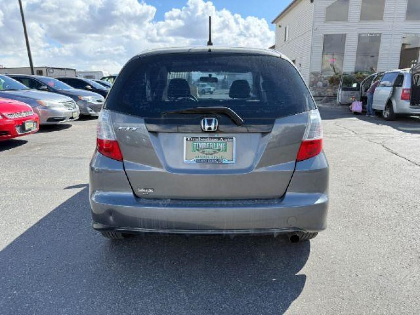 2013 GRAY /Gray Cloth Interior Honda Fit 5-Speed AT (JHMGE8H34DC) with an 1.5L L4 SOHC 16V engine, 5-Speed Automatic transmission, located at 1235 N Woodruff Ave., Idaho Falls, 83401, (208) 523-1053, 43.507172, -112.000488 - Photo#3