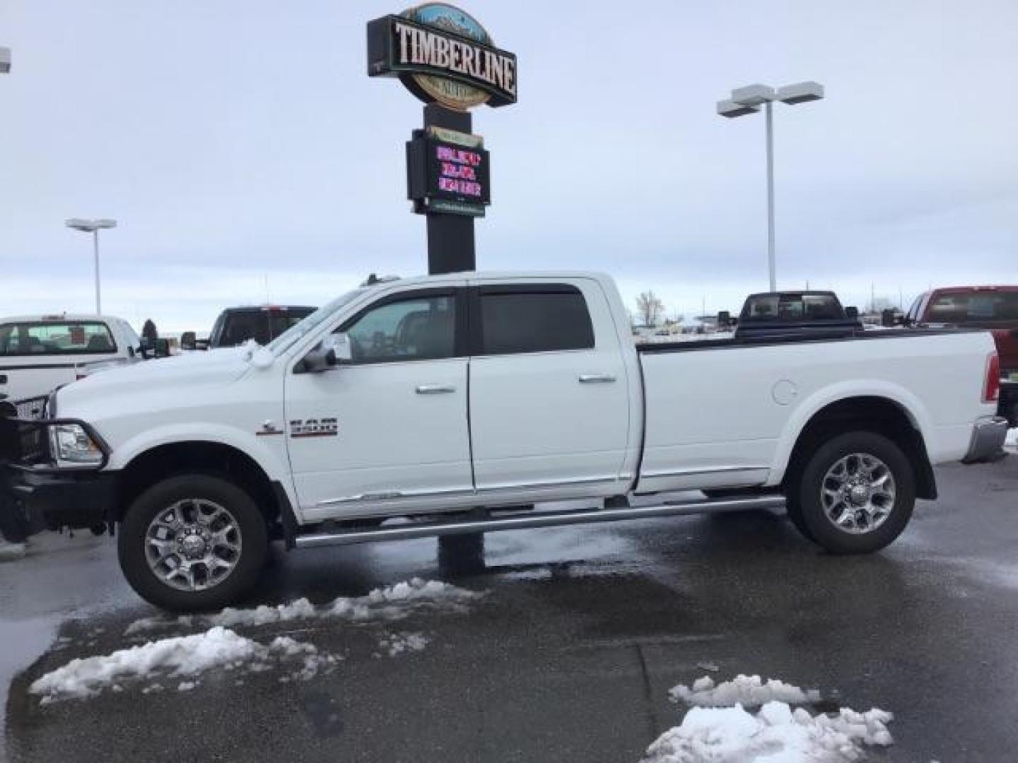 2017 Pearl White /Black/Cattle Tan, premium leather RAM 3500 Longhorn Crew Cab LWB 4WD (3C63R3KL4HG) with an 6.7L L6 OHV 24V TURBO DIESEL engine, 6-Speed Automatic transmission, located at 1235 N Woodruff Ave., Idaho Falls, 83401, (208) 523-1053, 43.507172, -112.000488 - Photo#1