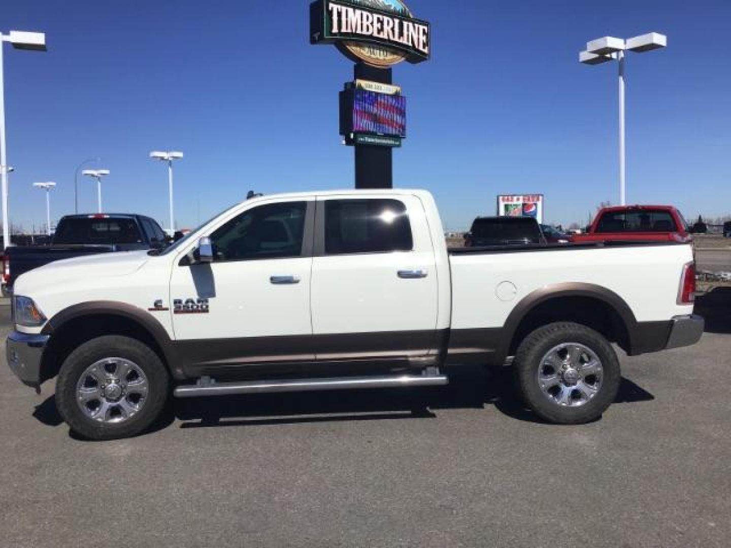 2017 WHITE /Black, leather RAM 3500 Laramie Crew Cab SWB 4WD (3C63R3EL0HG) with an 6.7L L6 OHV 24V TURBO DIESEL engine, 6-Speed Automatic transmission, located at 1235 N Woodruff Ave., Idaho Falls, 83401, (208) 523-1053, 43.507172, -112.000488 - Photo#1