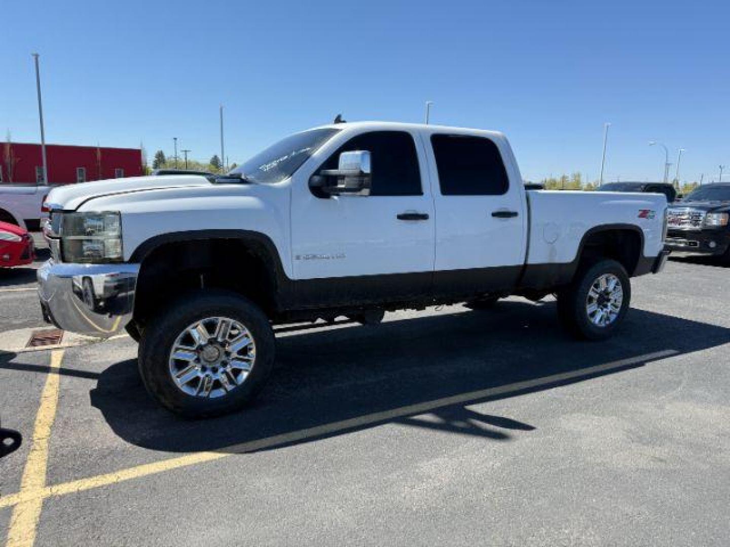 2008 Summit White /Ebony Cloth Interior Chevrolet Silverado 2500HD LT1 Crew Cab Long Box 4WD (1GCHK23638F) with an 6.6L V8 OHV 32V TURBO DIESEL engine, 6-Speed Automatic transmission, located at 1235 N Woodruff Ave., Idaho Falls, 83401, (208) 523-1053, 43.507172, -112.000488 - At Timberline Auto, finding a great deal on your next vehicle is always easy! Our experienced sales staff's goal is to help find you the right vehicle at the right price! Our knowledgeable finance department has options for almost any credit score. We offer extended service contract options to prote - Photo#0