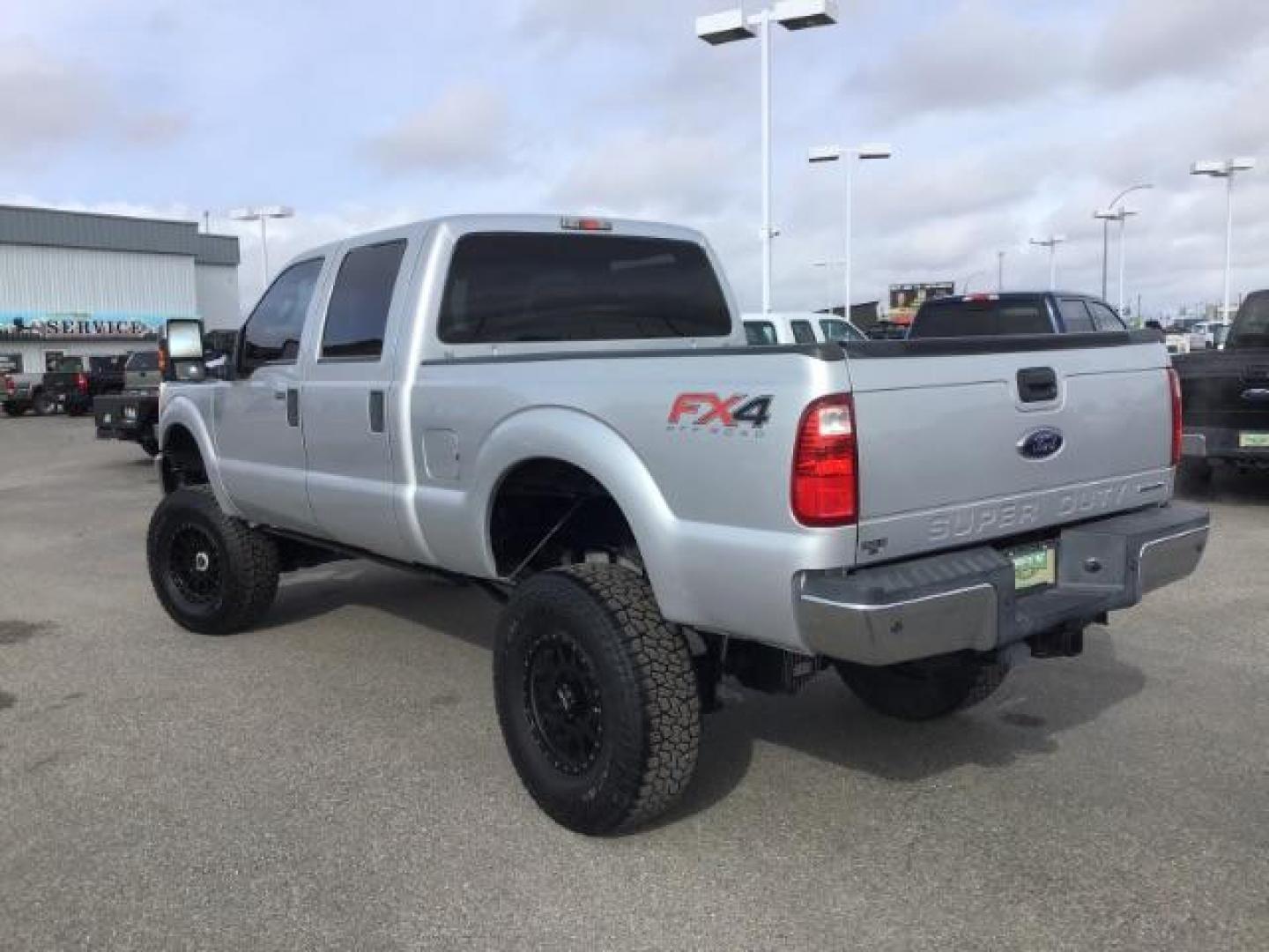 2013 Sterling Grey Metallic /Steel Cloth Interior Ford F-250 SD XLT Crew Cab 4WD (1FT7W2B66DE) with an 6.2L V8 OHV 16V engine, 6-Speed Automatic transmission, located at 1235 N Woodruff Ave., Idaho Falls, 83401, (208) 523-1053, 43.507172, -112.000488 - Photo#2