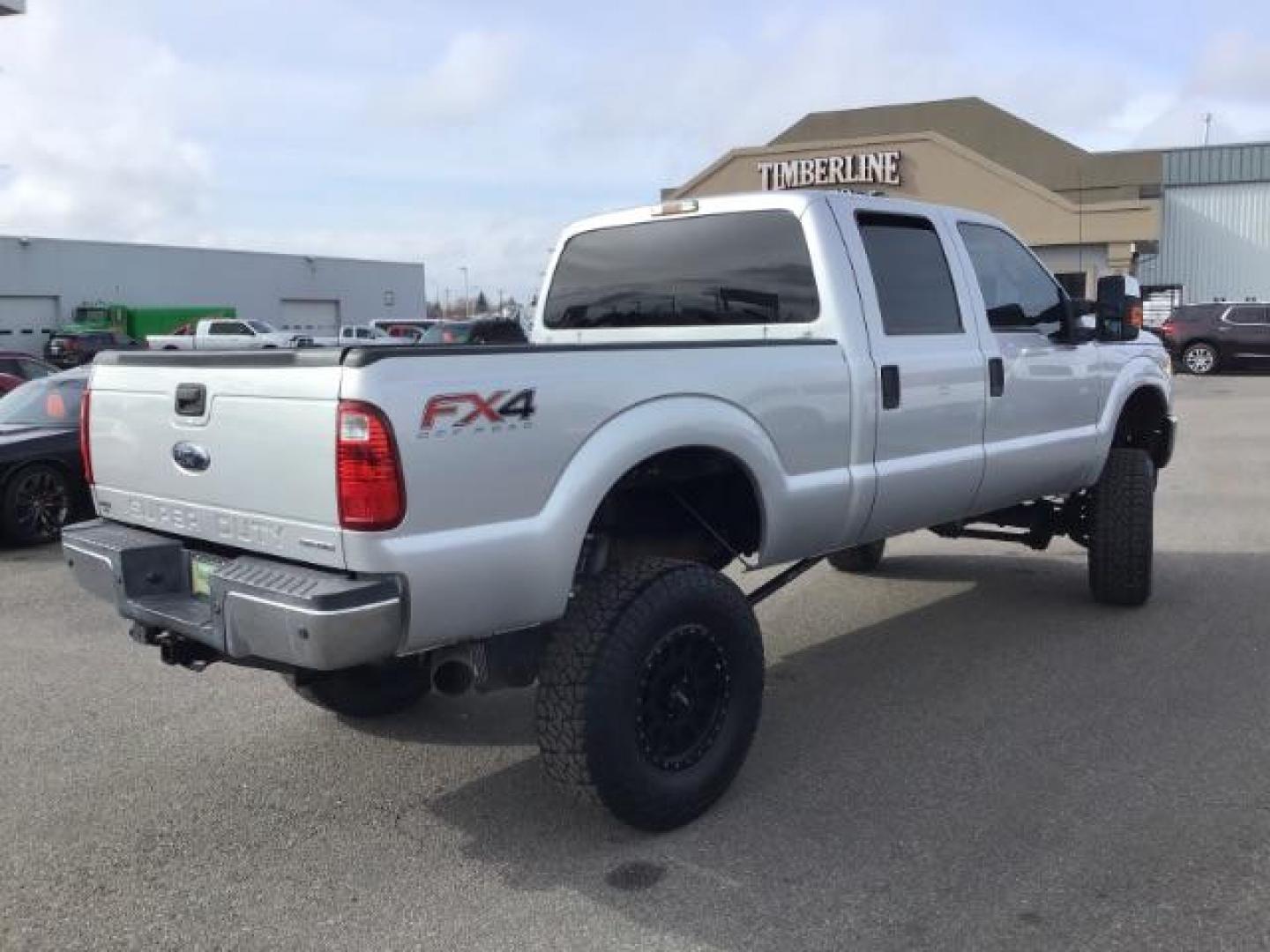 2013 Sterling Grey Metallic /Steel Cloth Interior Ford F-250 SD XLT Crew Cab 4WD (1FT7W2B66DE) with an 6.2L V8 OHV 16V engine, 6-Speed Automatic transmission, located at 1235 N Woodruff Ave., Idaho Falls, 83401, (208) 523-1053, 43.507172, -112.000488 - Photo#4