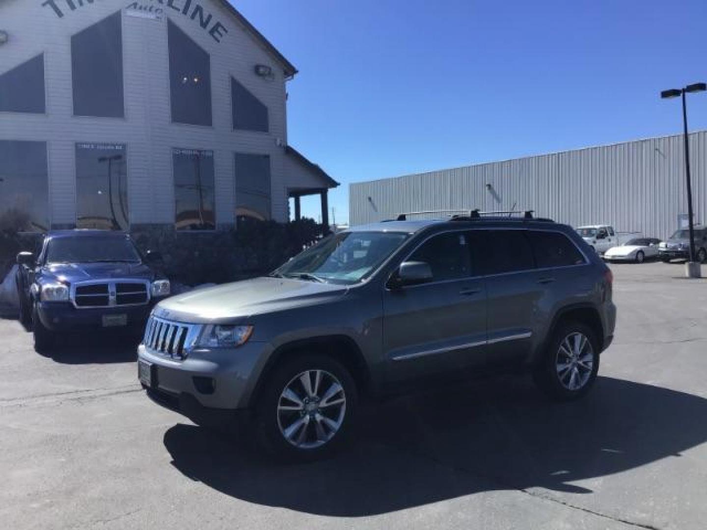 2013 Jeep Grand Cherokee SPORT UTILITY 4-DR (1C4RJFAG5DC) with an 3.6L V6 DOHC 24V engine, 5-Speed Automatic transmission, located at 1235 N Woodruff Ave., Idaho Falls, 83401, (208) 523-1053, 43.507172, -112.000488 - Photo#0