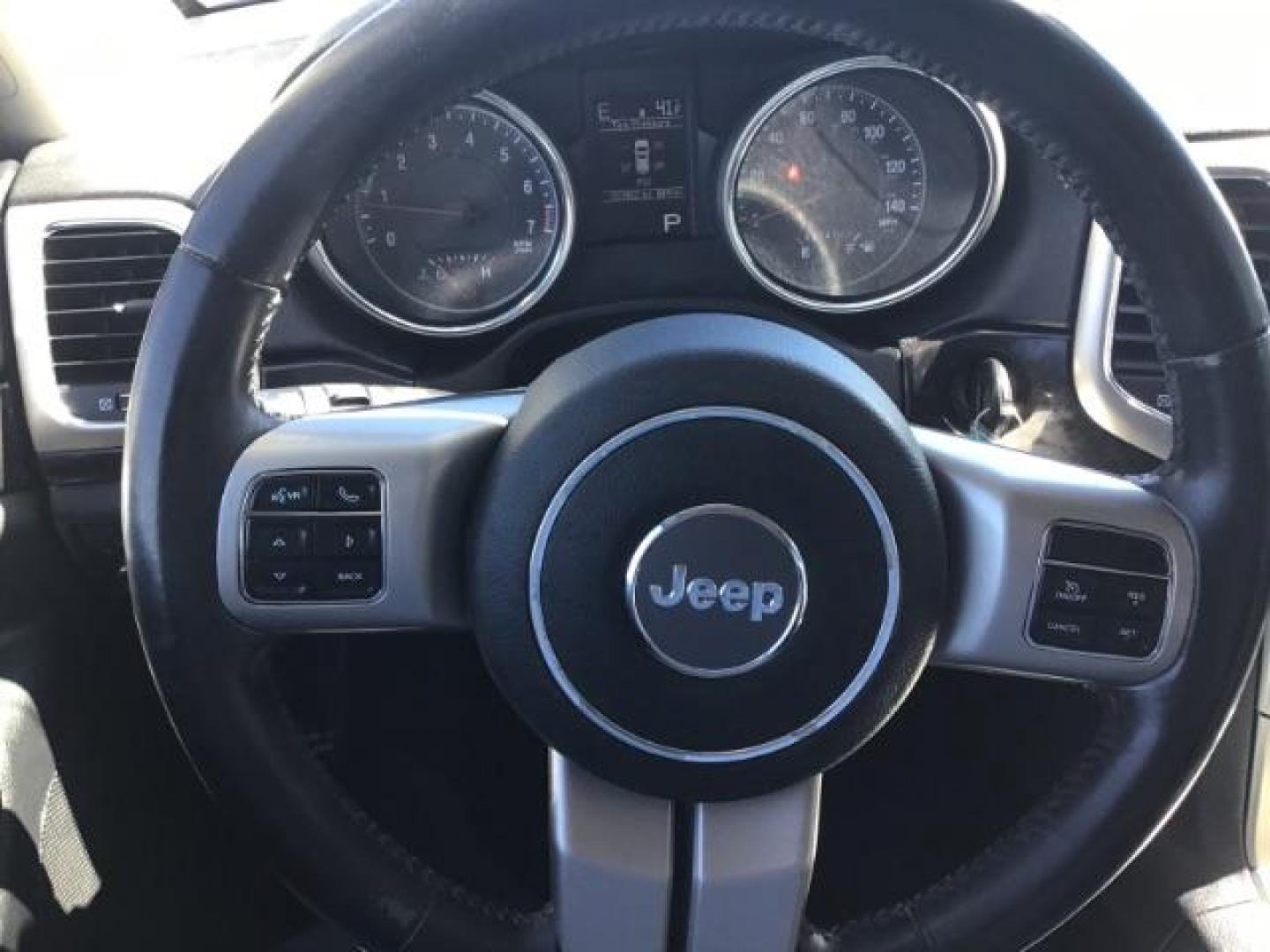 2013 Jeep Grand Cherokee SPORT UTILITY 4-DR (1C4RJFAG5DC) with an 3.6L V6 DOHC 24V engine, 5-Speed Automatic transmission, located at 1235 N Woodruff Ave., Idaho Falls, 83401, (208) 523-1053, 43.507172, -112.000488 - Photo#14
