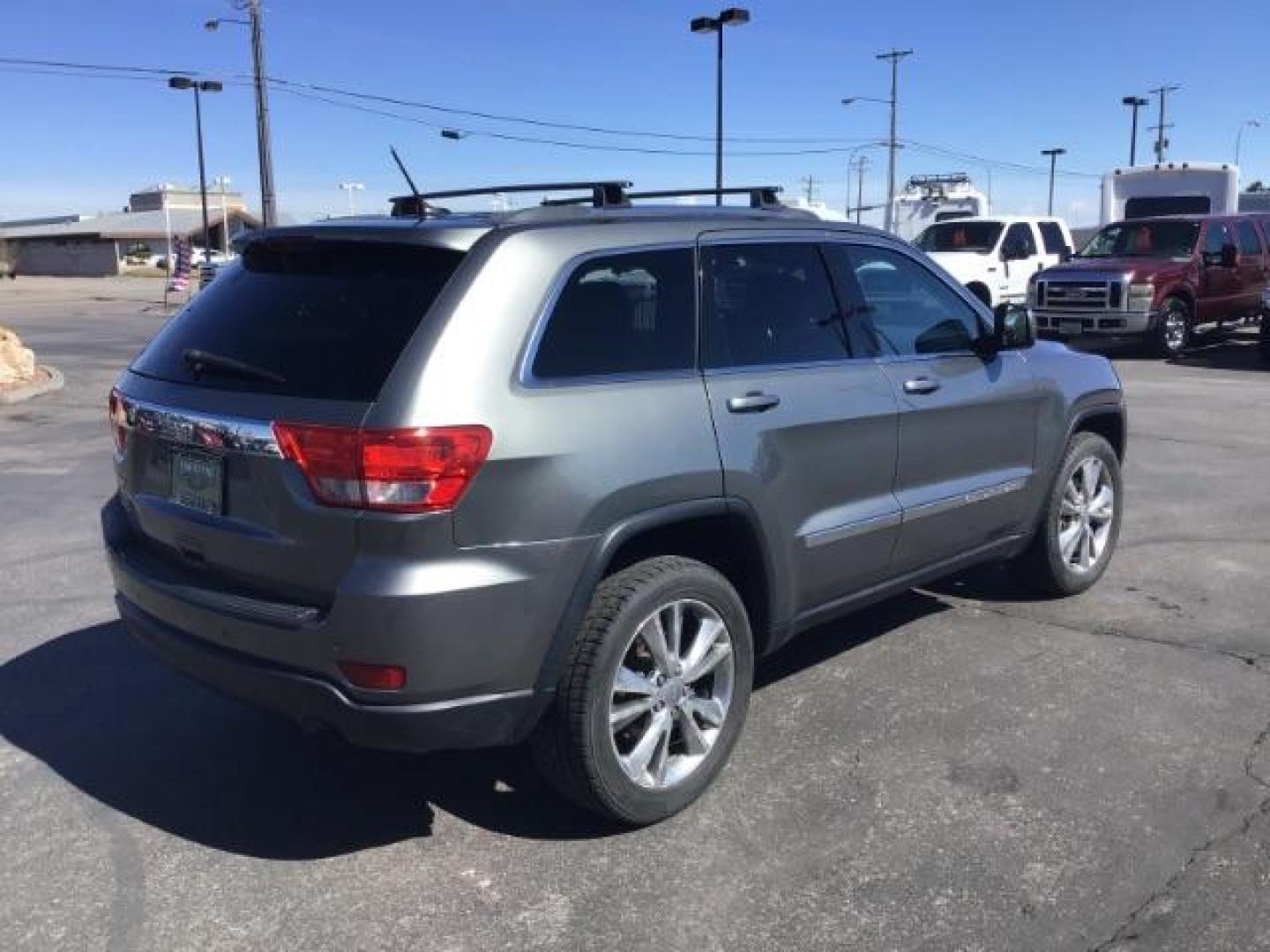 2013 Jeep Grand Cherokee SPORT UTILITY 4-DR (1C4RJFAG5DC) with an 3.6L V6 DOHC 24V engine, 5-Speed Automatic transmission, located at 1235 N Woodruff Ave., Idaho Falls, 83401, (208) 523-1053, 43.507172, -112.000488 - Photo#4