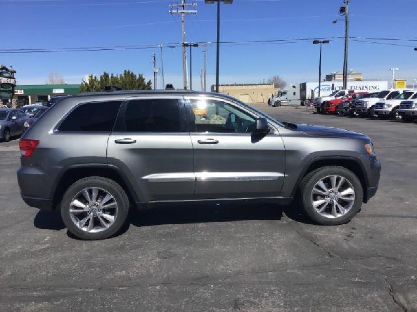 2013 Jeep Grand Cherokee SPORT UTILITY 4-DR (1C4RJFAG5DC) with an 3.6L V6 DOHC 24V engine, 5-Speed Automatic transmission, located at 1235 N Woodruff Ave., Idaho Falls, 83401, (208) 523-1053, 43.507172, -112.000488 - Photo#5