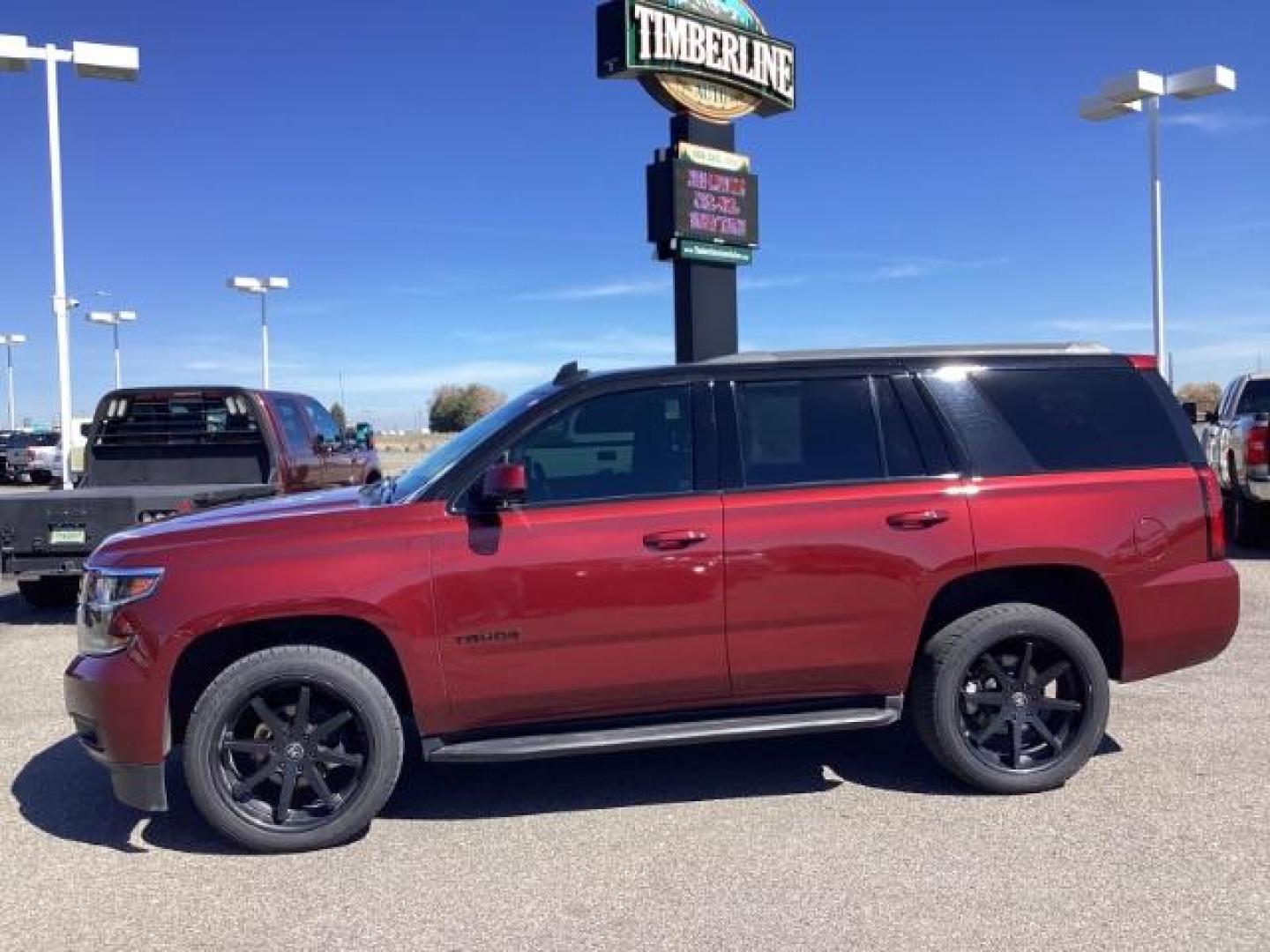 2020 Black Cherry Metallic /Jet Black, leather Chevrolet Tahoe LT 4WD (1GNSKBKC7LR) with an 5.3L V8 OHV 16V engine, 6-Speed Automatic transmission, located at 1235 N Woodruff Ave., Idaho Falls, 83401, (208) 523-1053, 43.507172, -112.000488 - The 2020 Chevrolet Tahoe LT is a well-equipped trim level of the popular full-size SUV. It comes with a range of features designed to provide comfort, convenience, safety, and performance. Here are some of the notable features you might find on the 2020 Chevy Tahoe LT: V8 Engine: The Tahoe LT typic - Photo#1